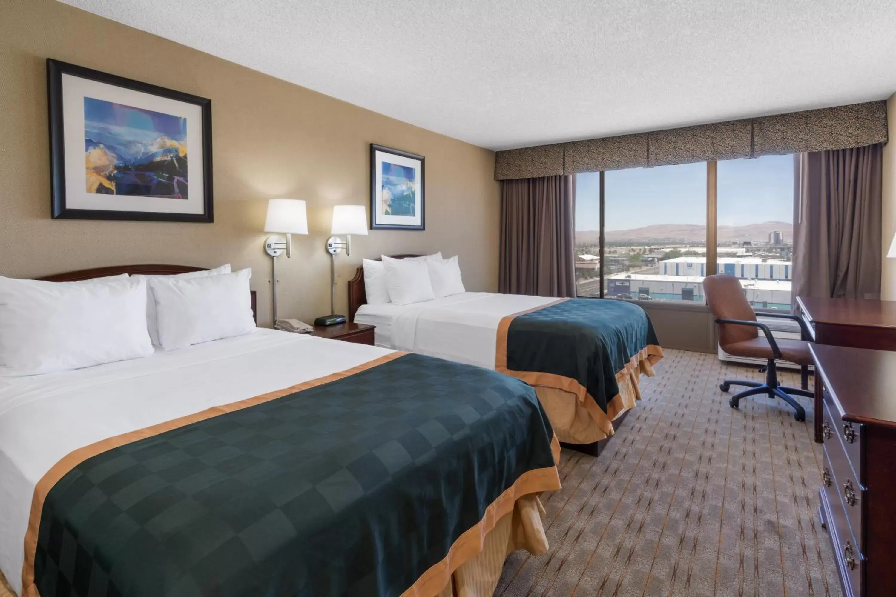Bedroom, Bed in Ramada by Wyndham Reno Hotel & Casino
