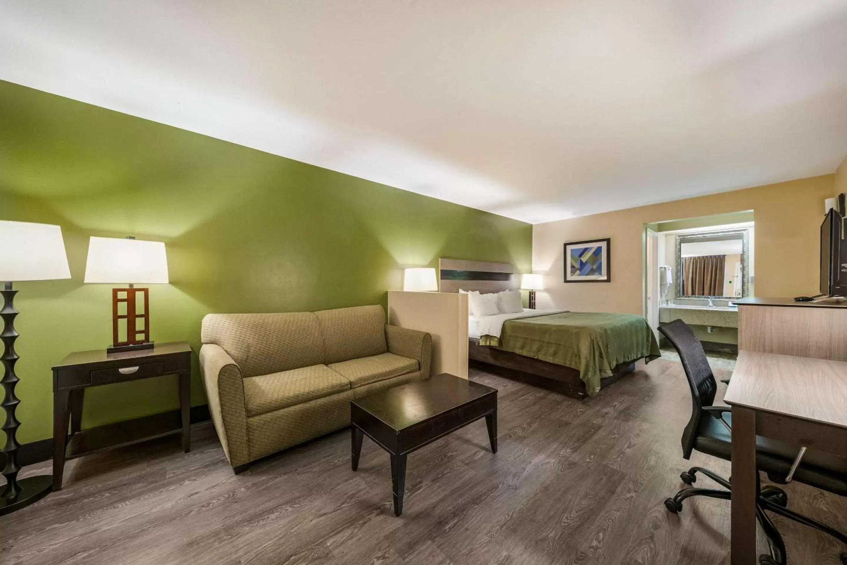 Bed, Seating Area in Quality Inn & Suites - Garland