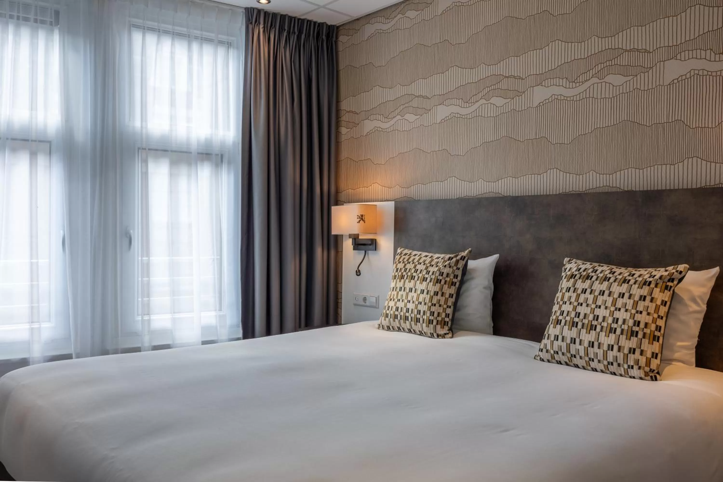 Bed in Hotel Amsterdam De Roode Leeuw