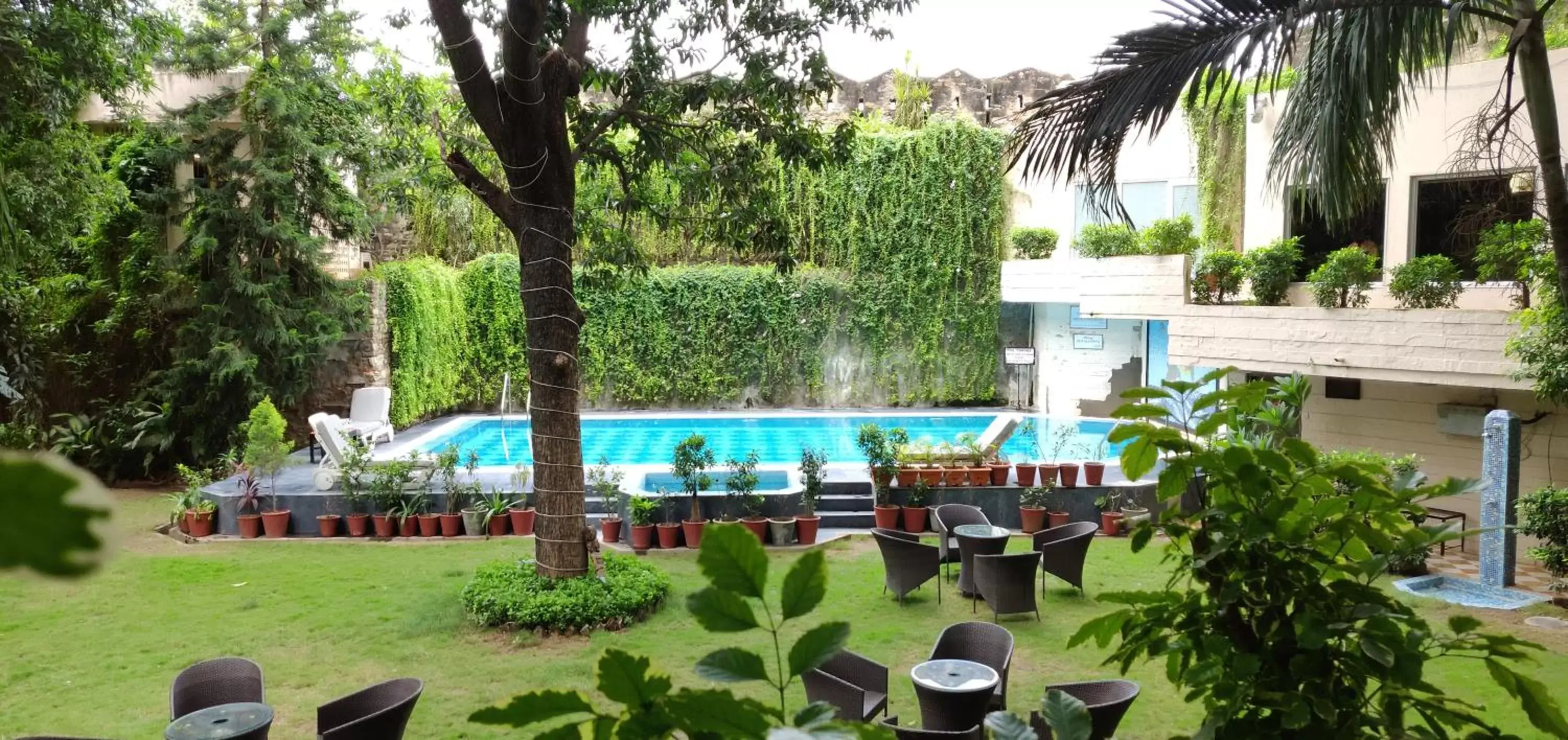 Garden, Pool View in Rajdarshan - A Lake View Hotel in Udaipur