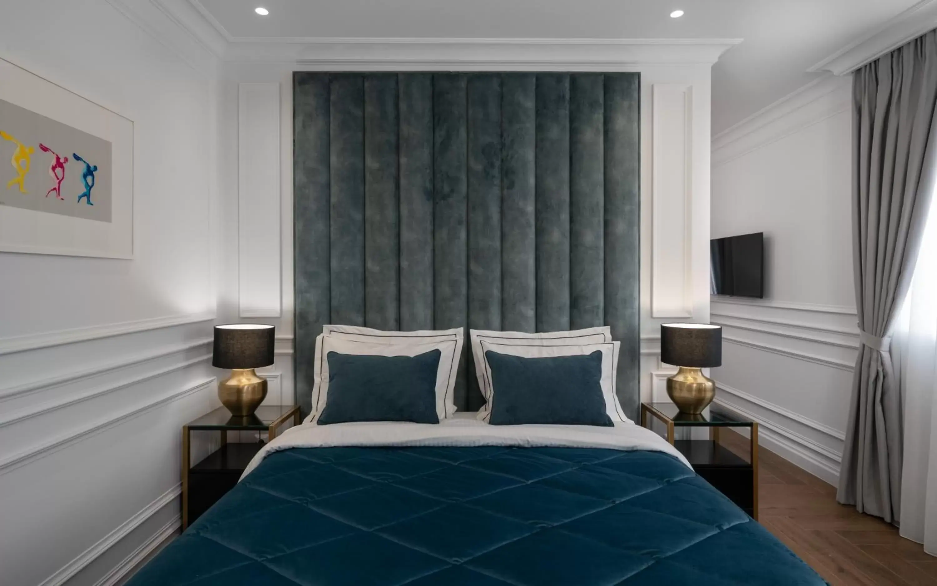 Bed in Praxitelous Luxury Suites