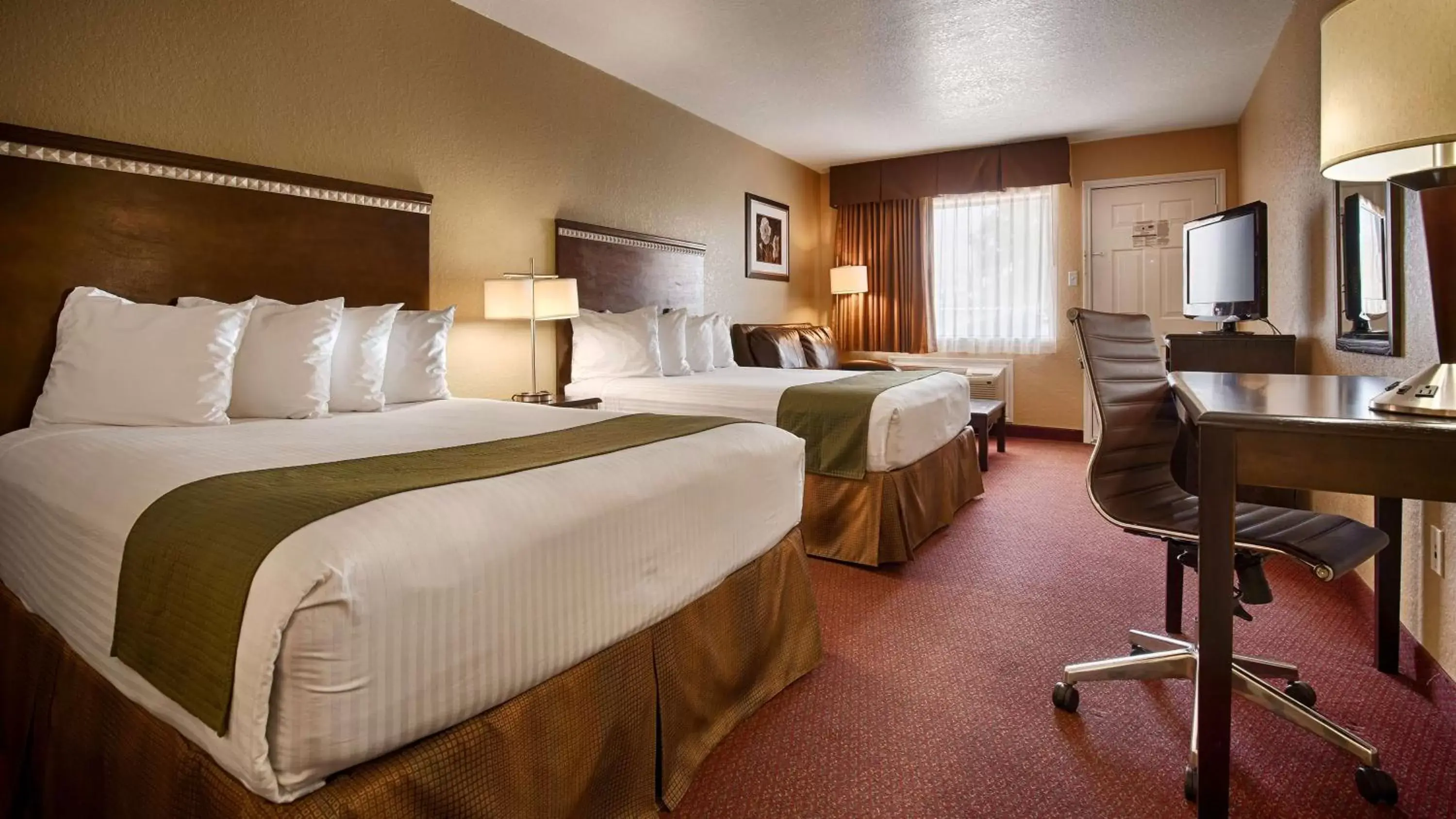 Queen Room with Two Queen Beds and Sofa Bed - Non-Smoking in SureStay Hotel by Best Western Floresville Queen Room with Two Queen Beds and Sofa Bed - Non-Smoking in SureStay Hotel by Best Western Floresville