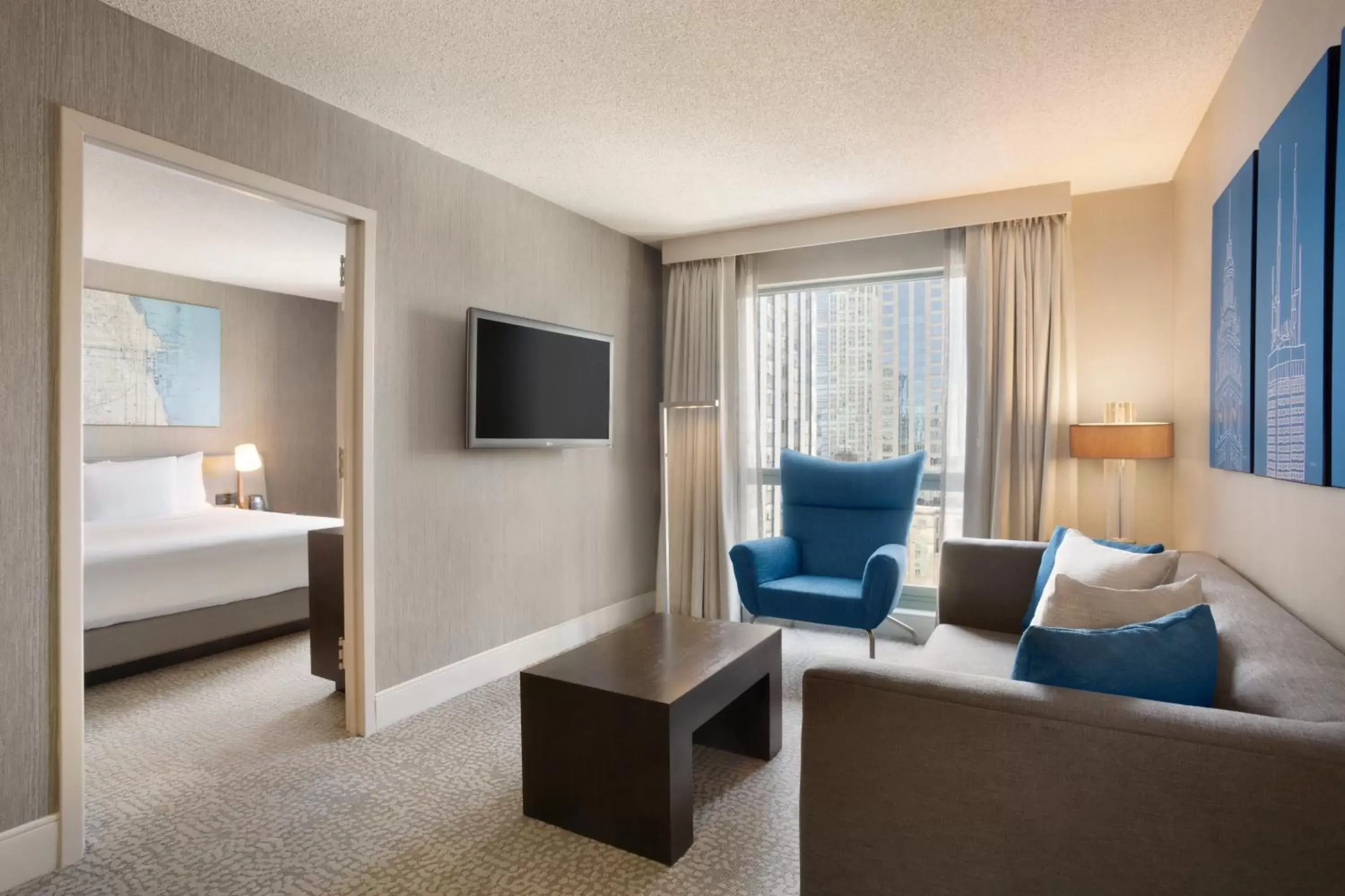 TV and multimedia, Seating Area in Hilton Chicago Magnificent Mile Suites