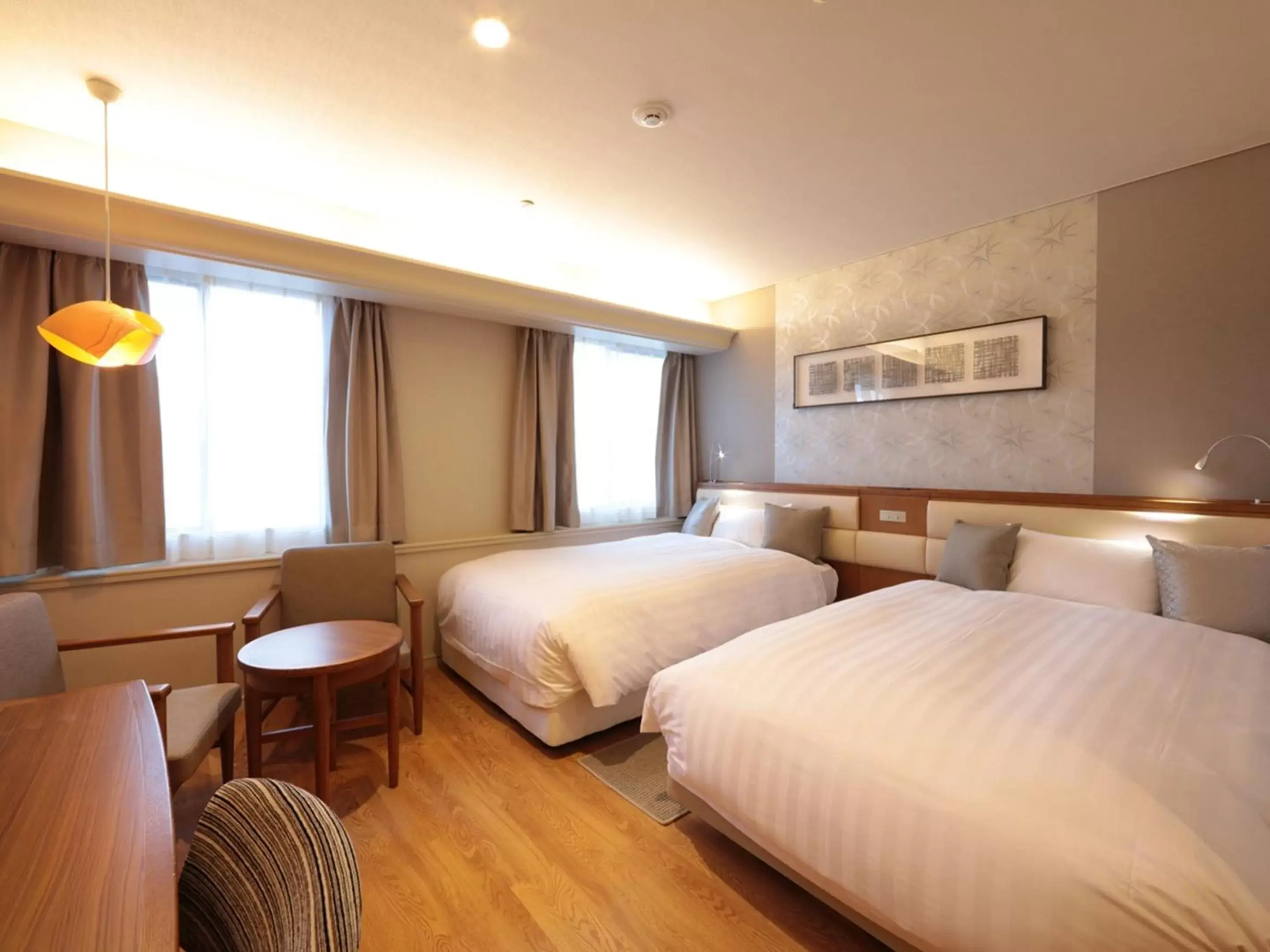 Photo of the whole room, Bed in Hotel Monarque Tottori