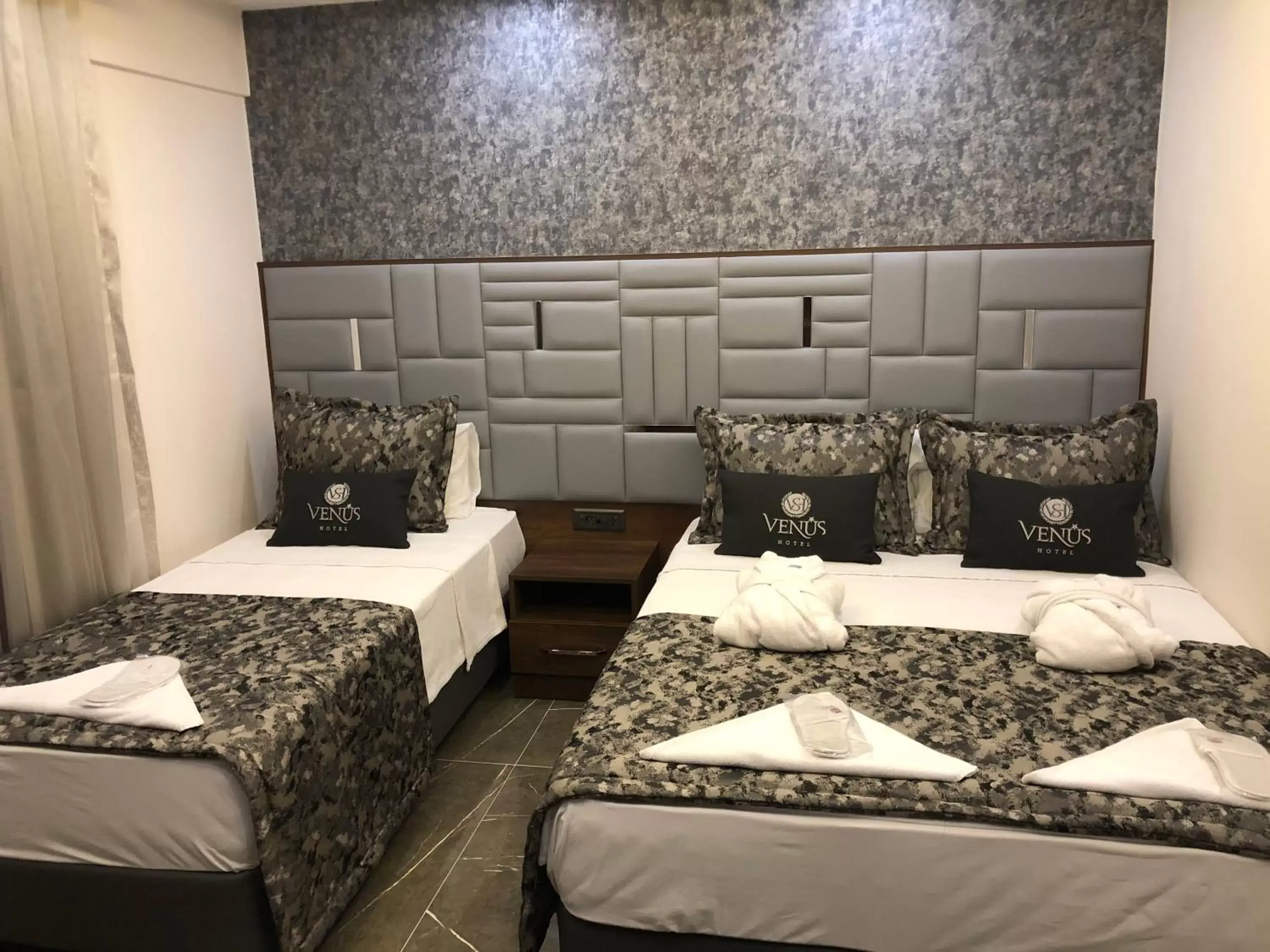 Bed in Venus Hotel Bed in Venus Hotel