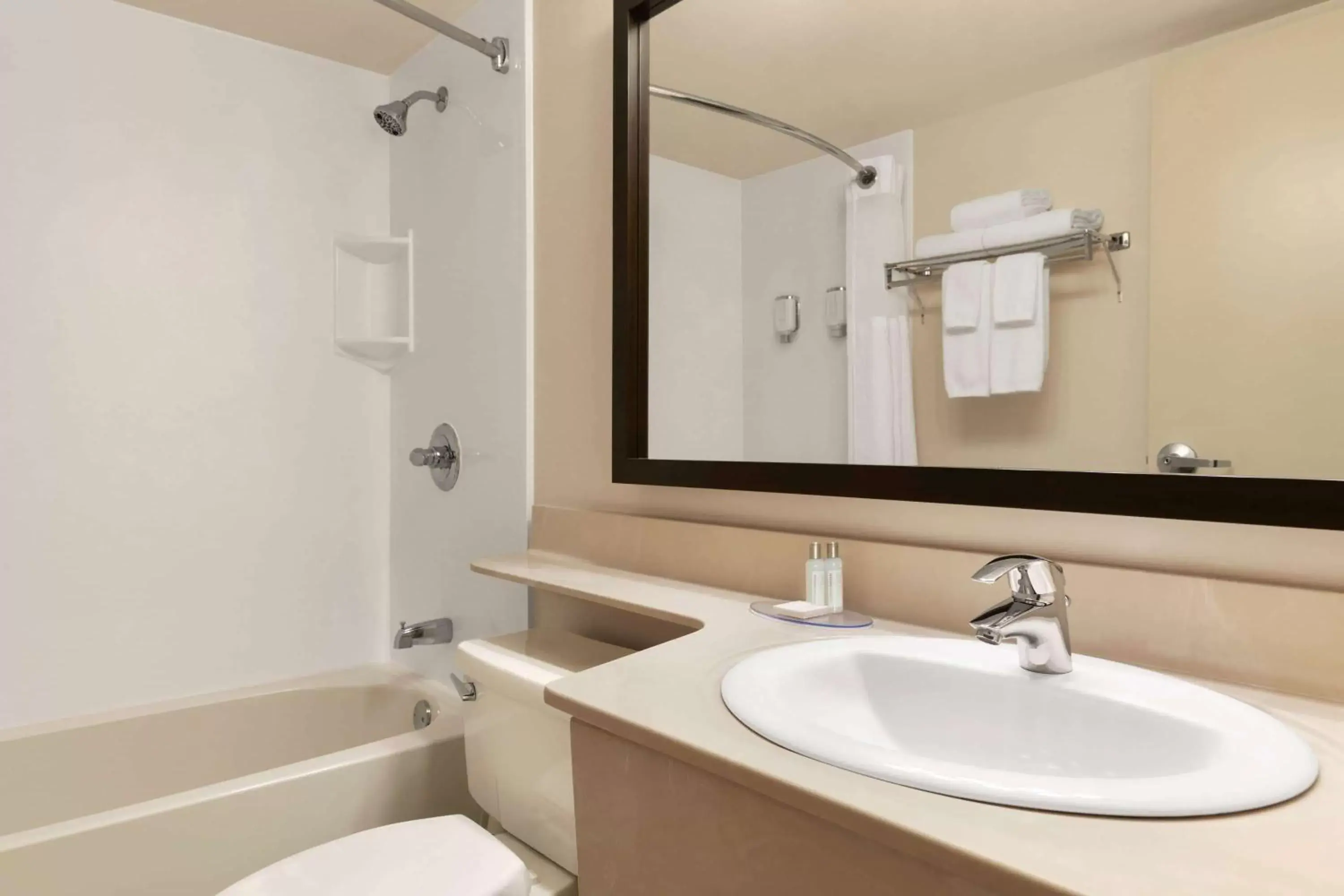 Bathroom in Travelodge Suites by Wyndham Moncton
