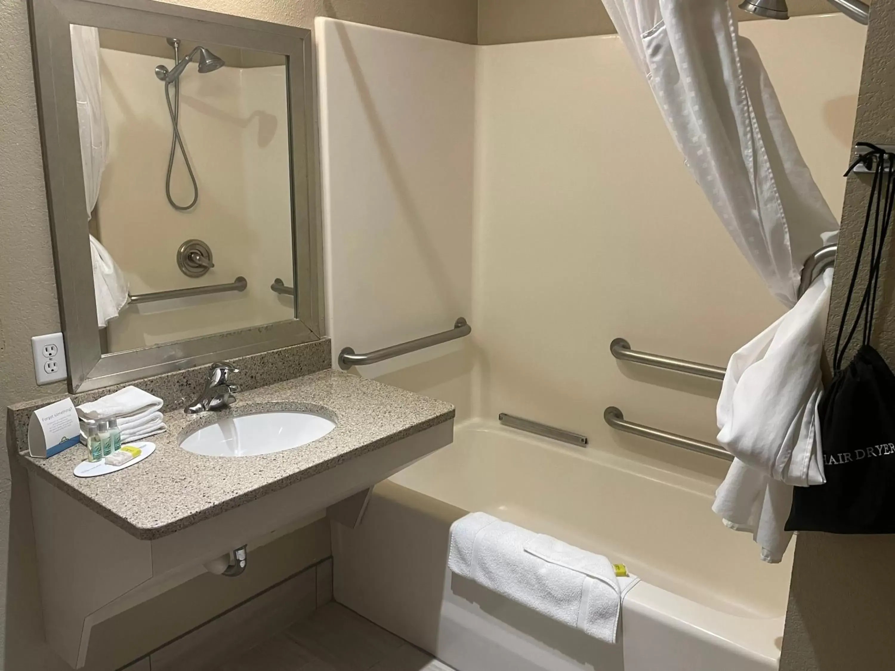 Bathroom in Days Inn & Suites by Wyndham La Crosse-Onalaska