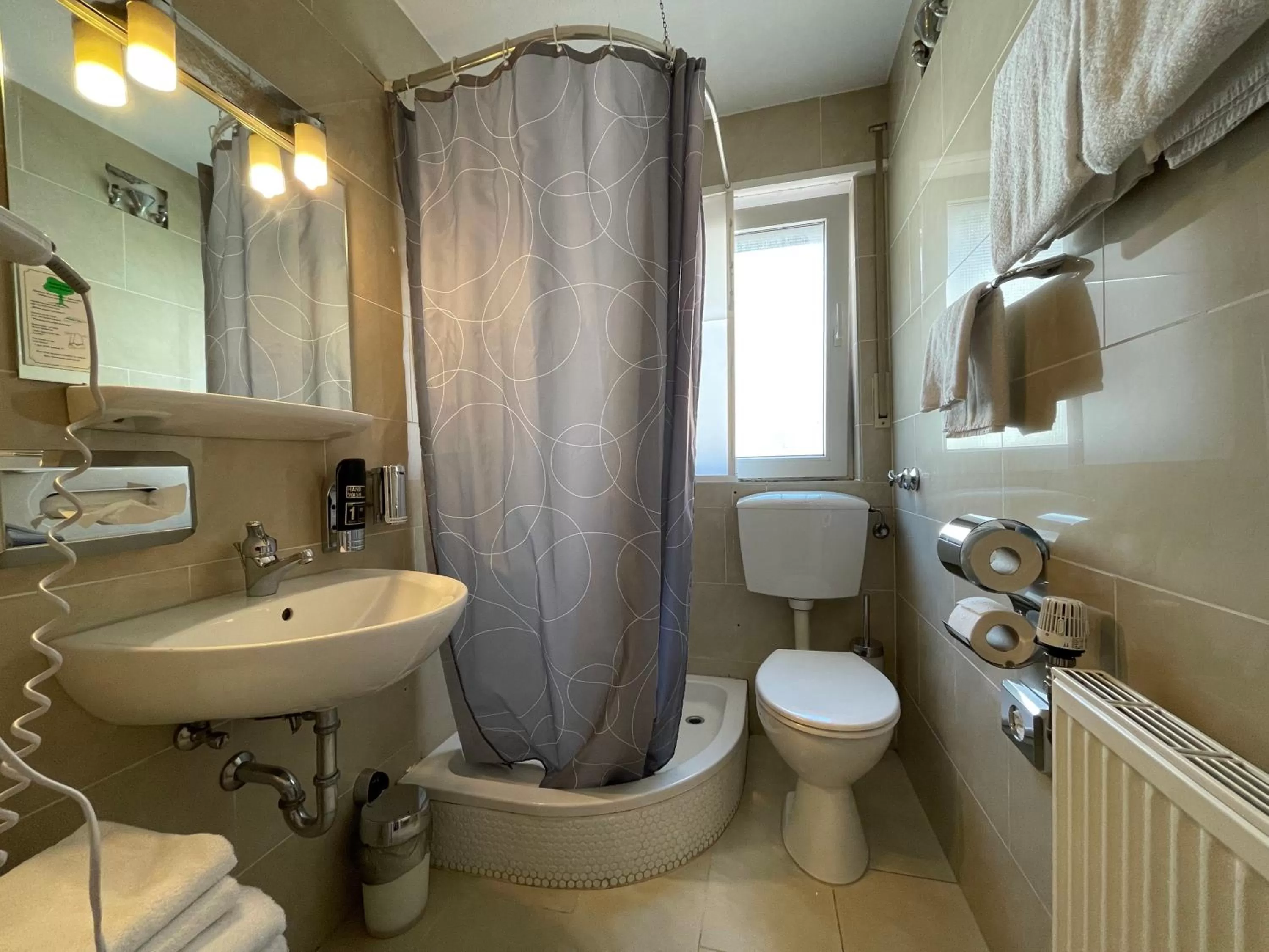 Bathroom in Hafner Hotel- Apartment