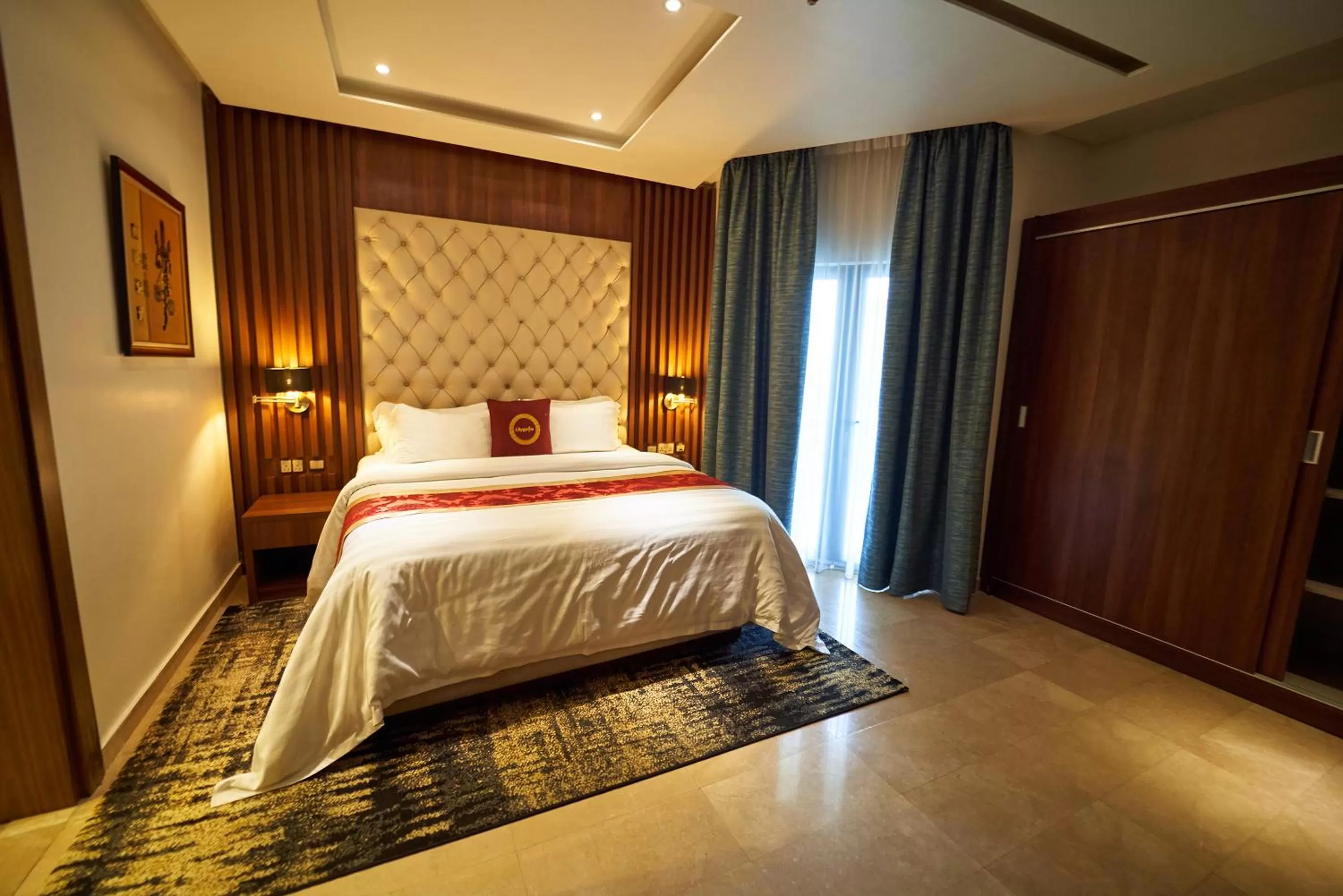 Photo of the whole room, Bed in The Lilygate Lagos