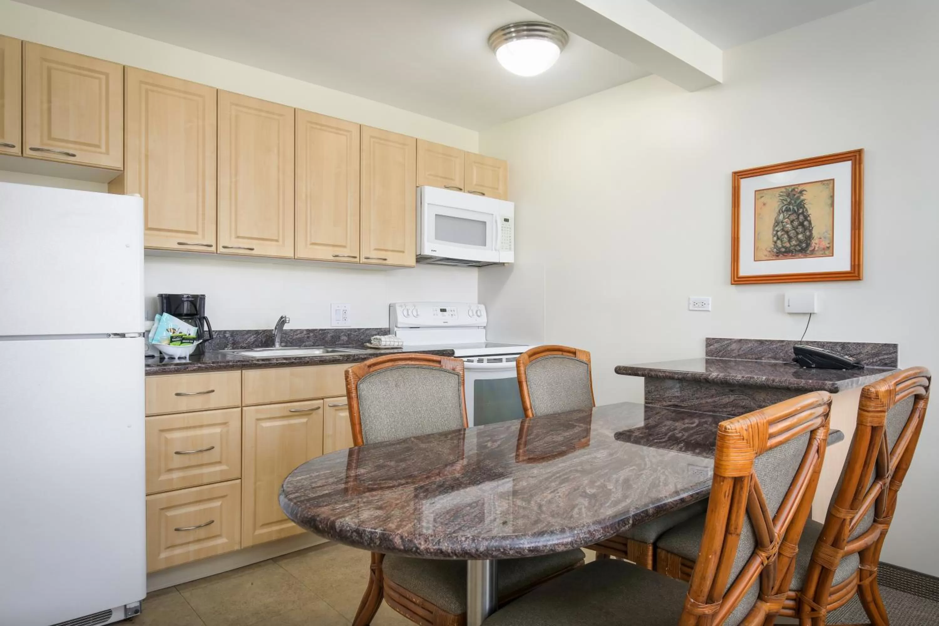Kitchen or kitchenette in Aston Waikiki Sunset