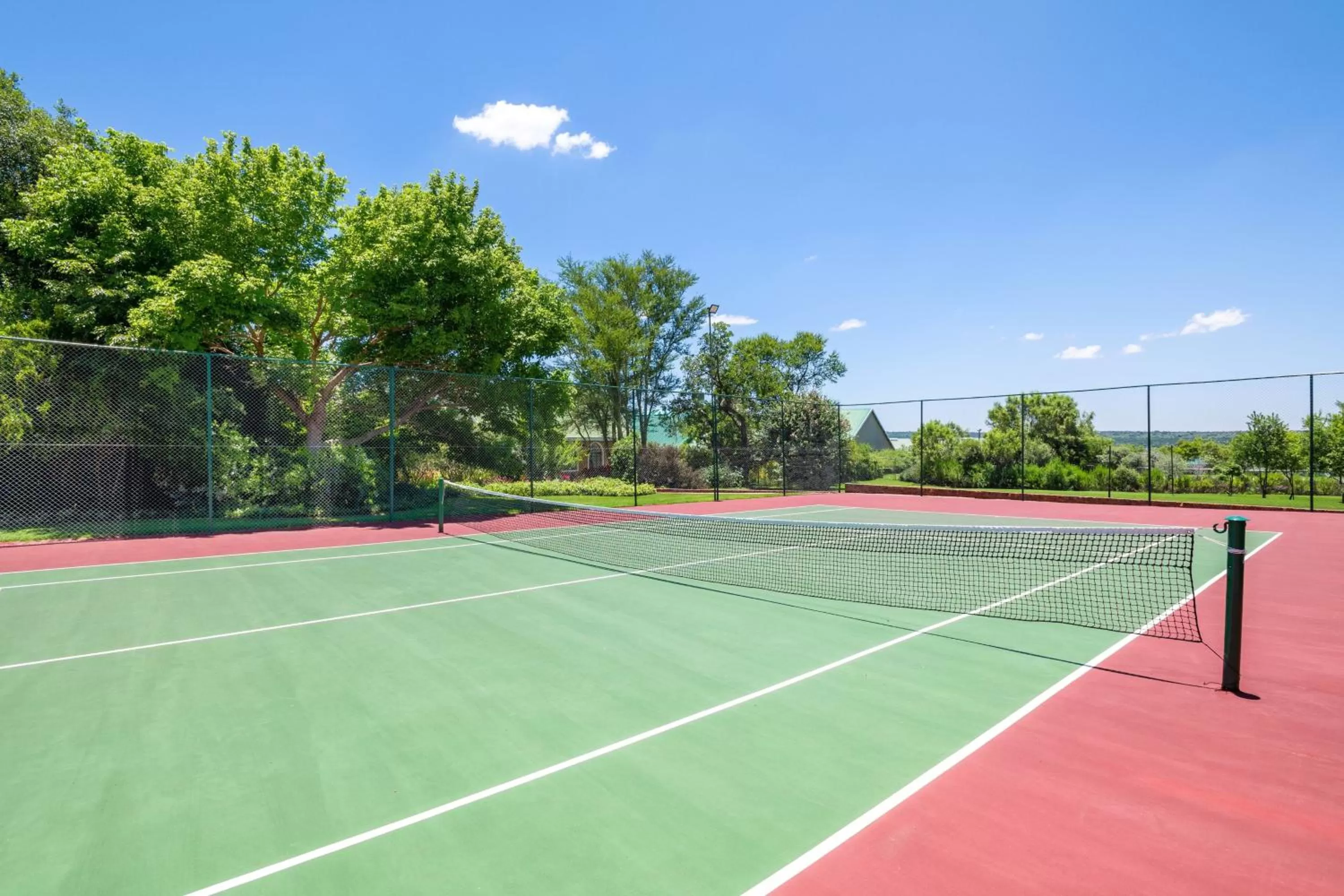 Tennis court in Protea Hotel by Marriott Polokwane Ranch Resort