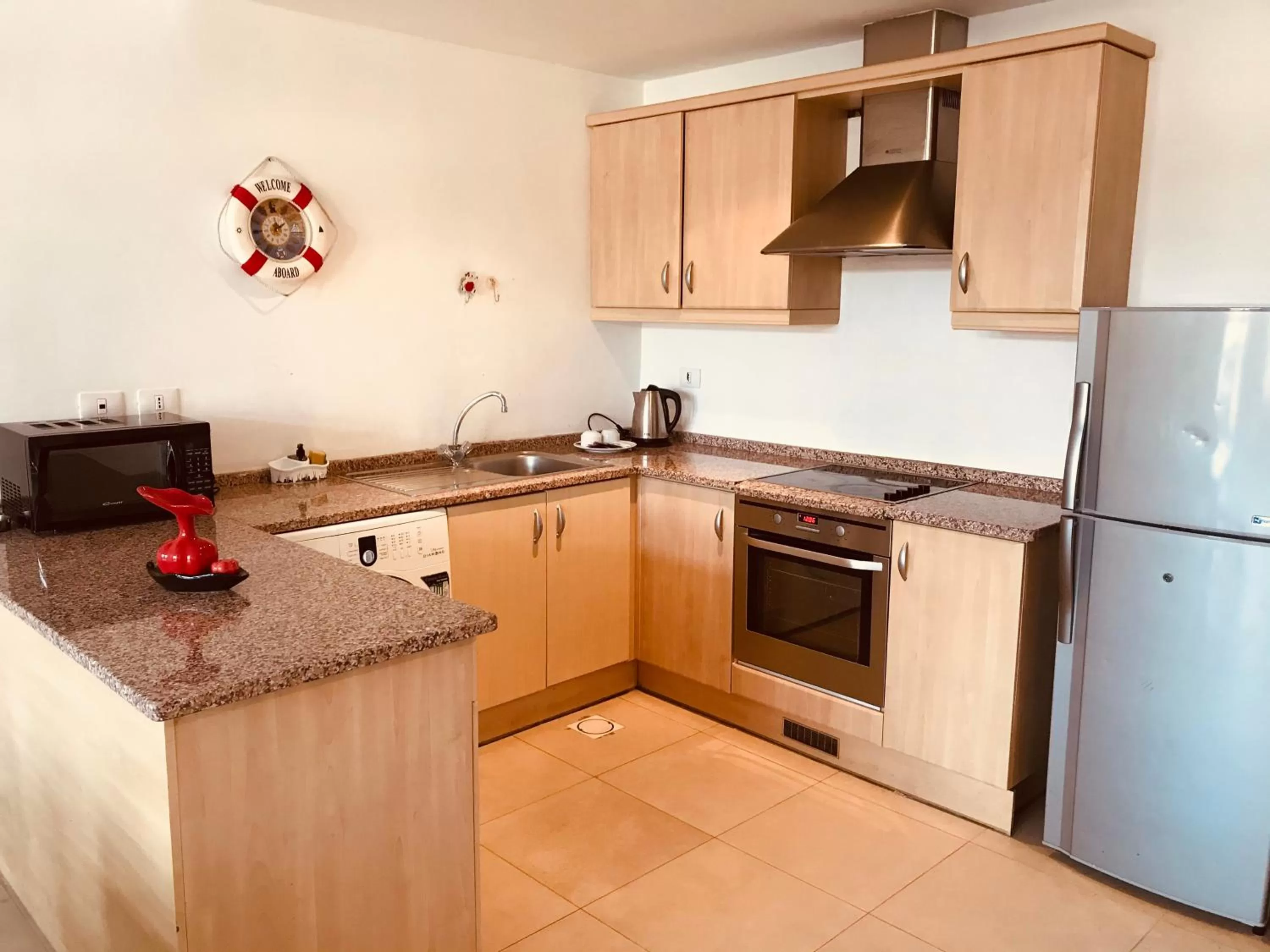 Kitchen or kitchenette in Tala Bay Residence - Families Only