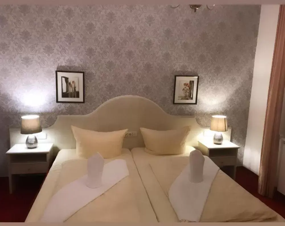 Bed in Hotel Kaiserhof Deluxe
