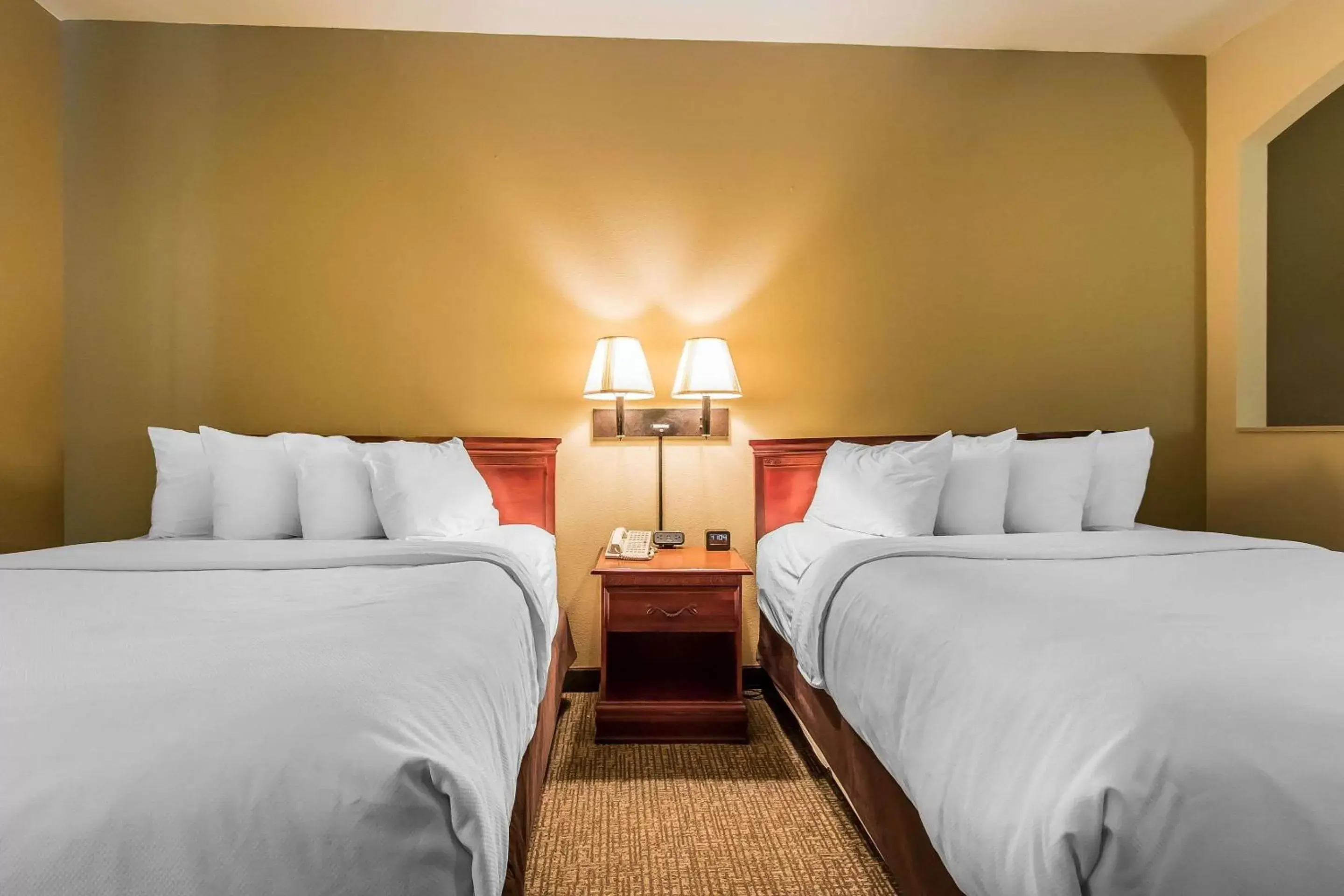 Photo of the whole room, Bed in Quality Suites New Iberia Photo of the whole room, Bed in Quality Suites New Iberia