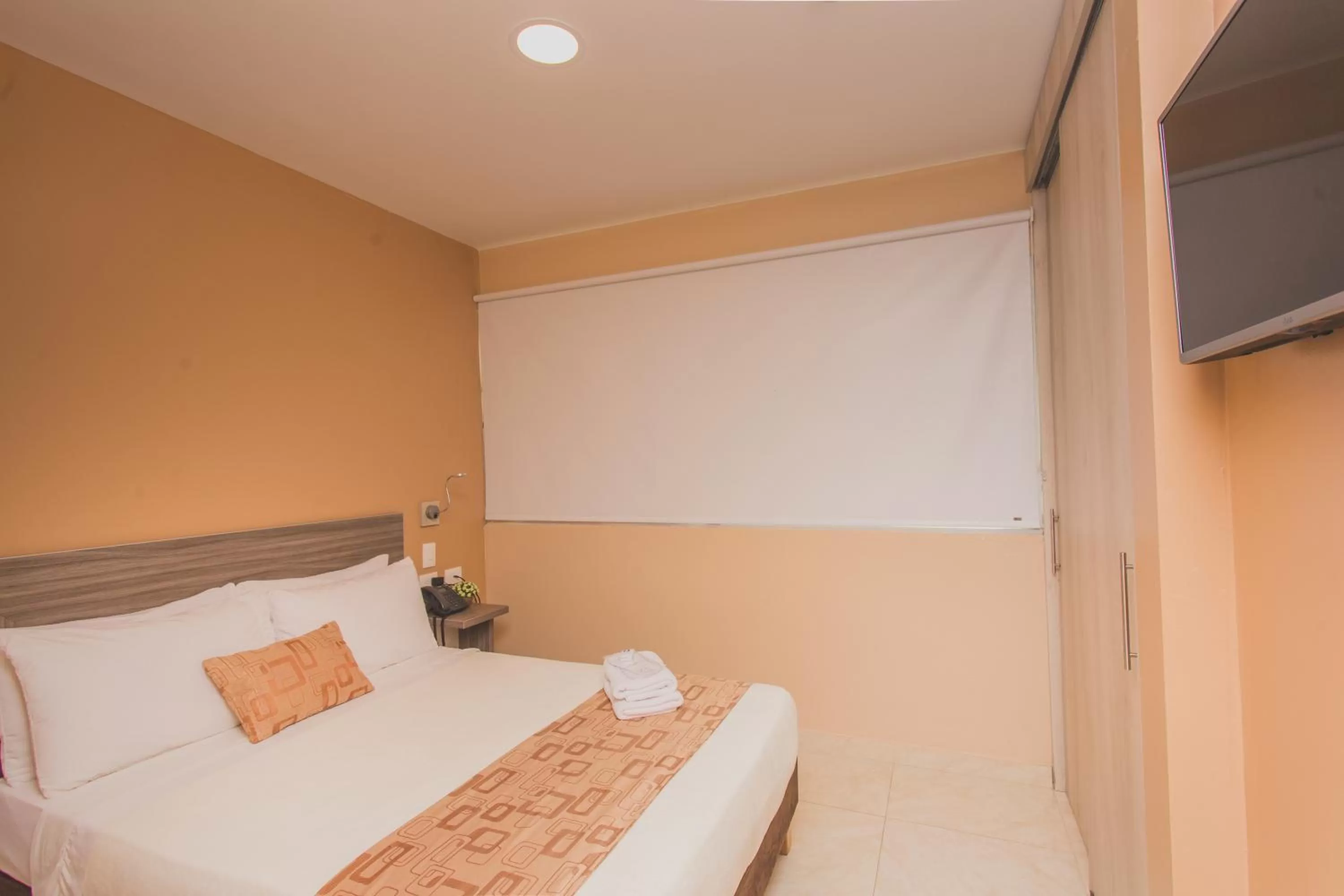 Bed in Hotel Aixo Suites By GEH Suites