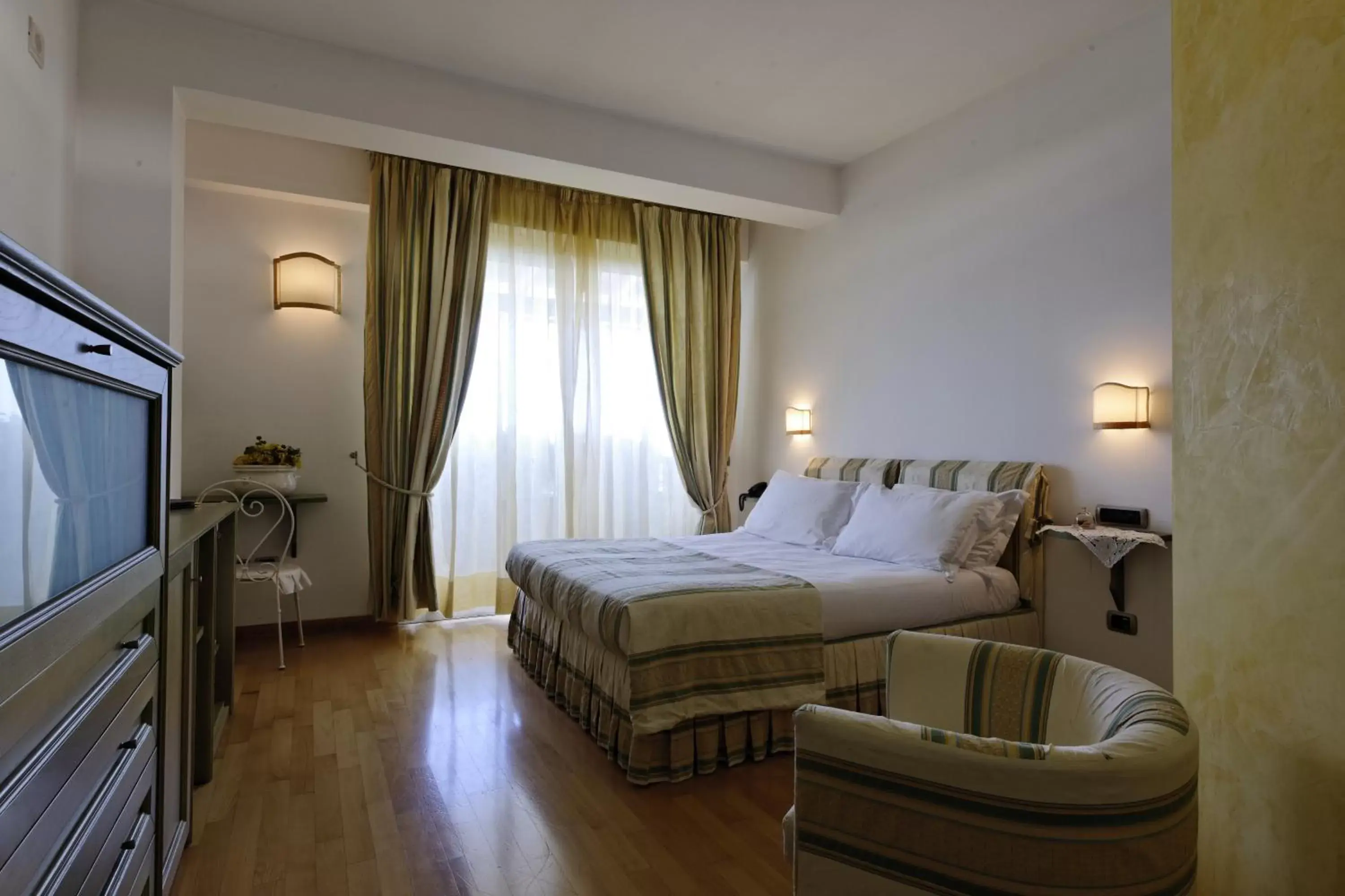 Bed in Hotel Villa Poseidon & Events