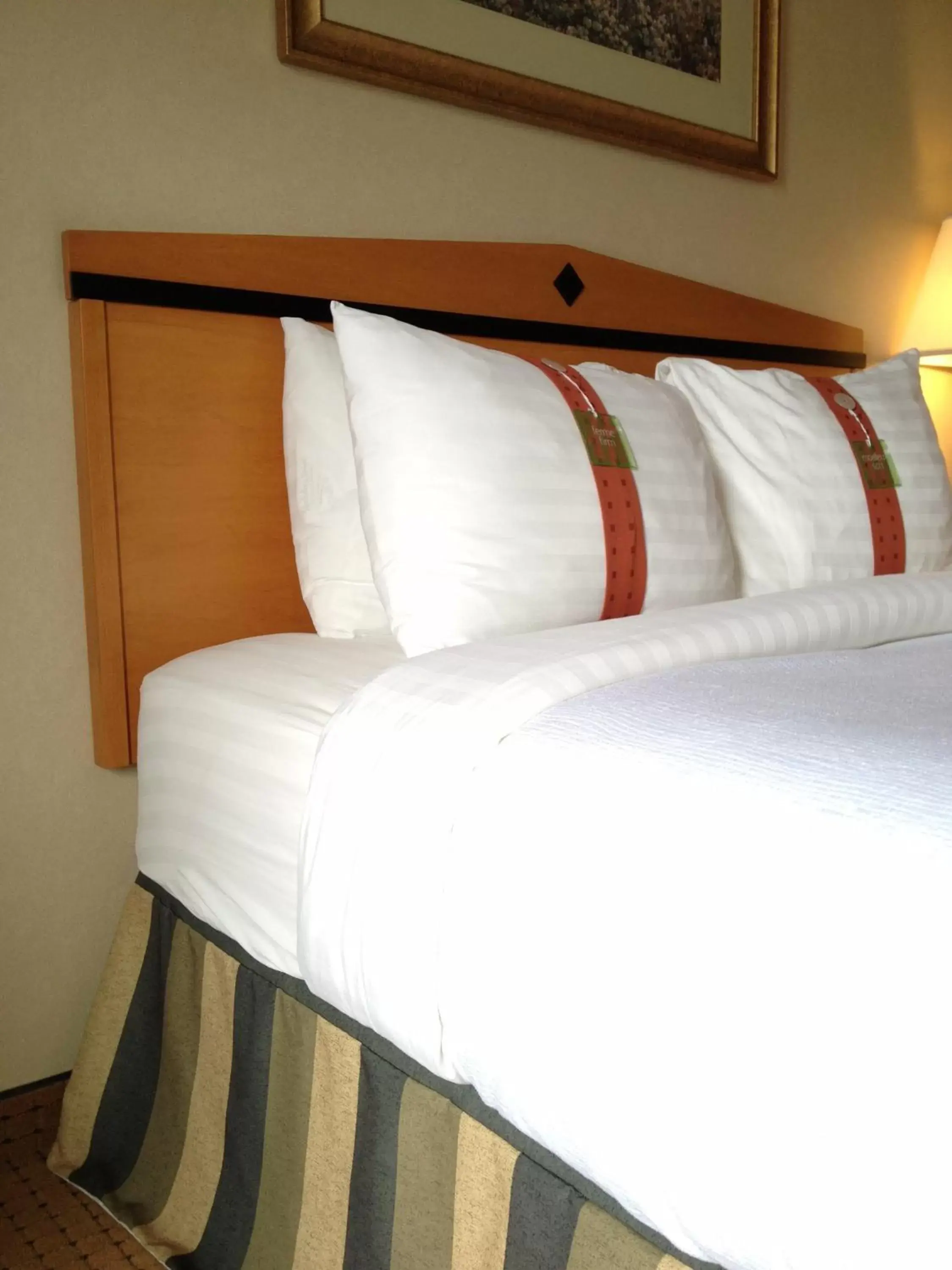 Bed in Holiday Inn Hotel & Suites Osoyoos, an IHG Hotel