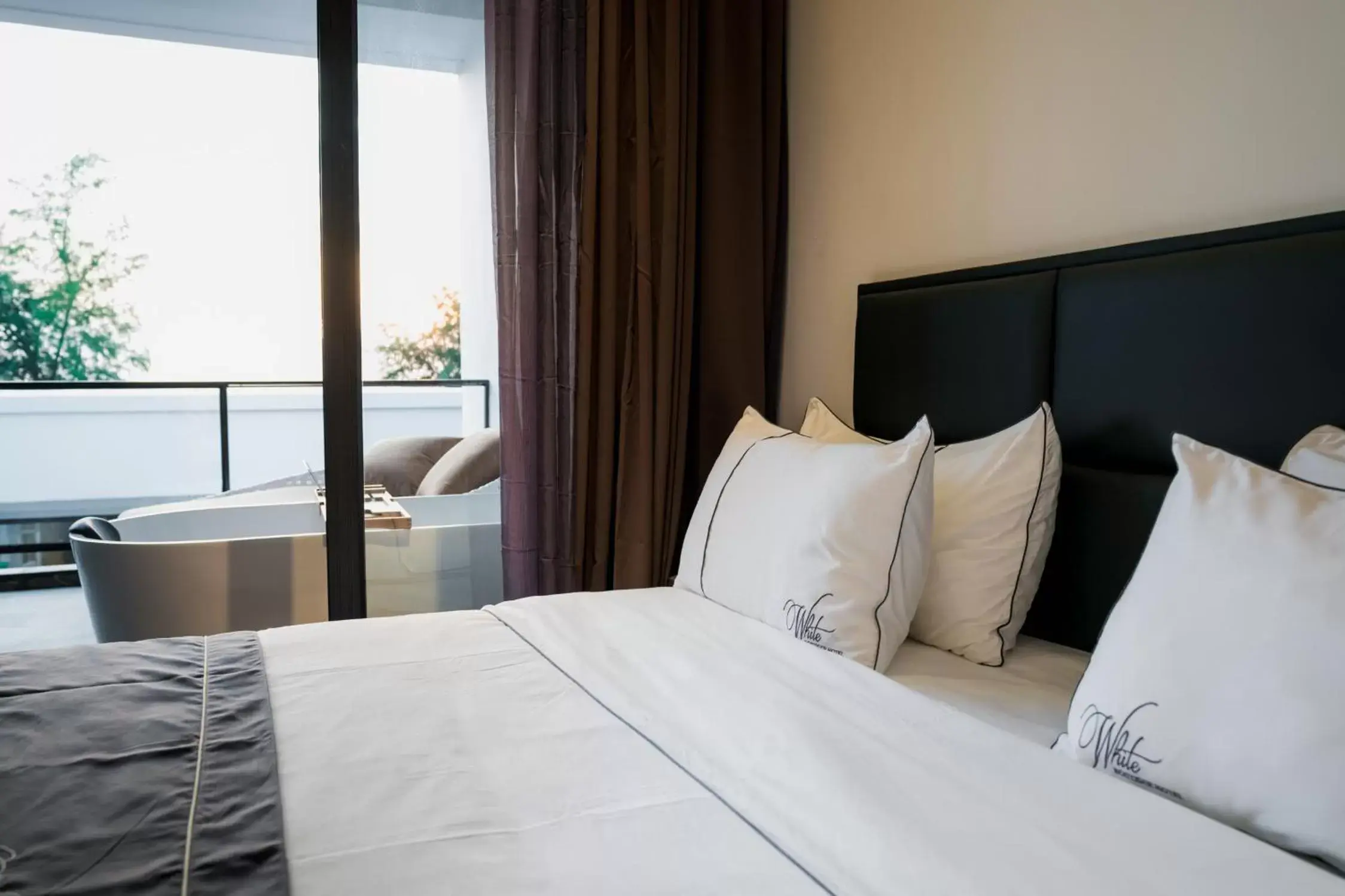 Suite with Balcony in White Boutique Hotel and Residences Suite with Balcony in White Boutique Hotel and Residences