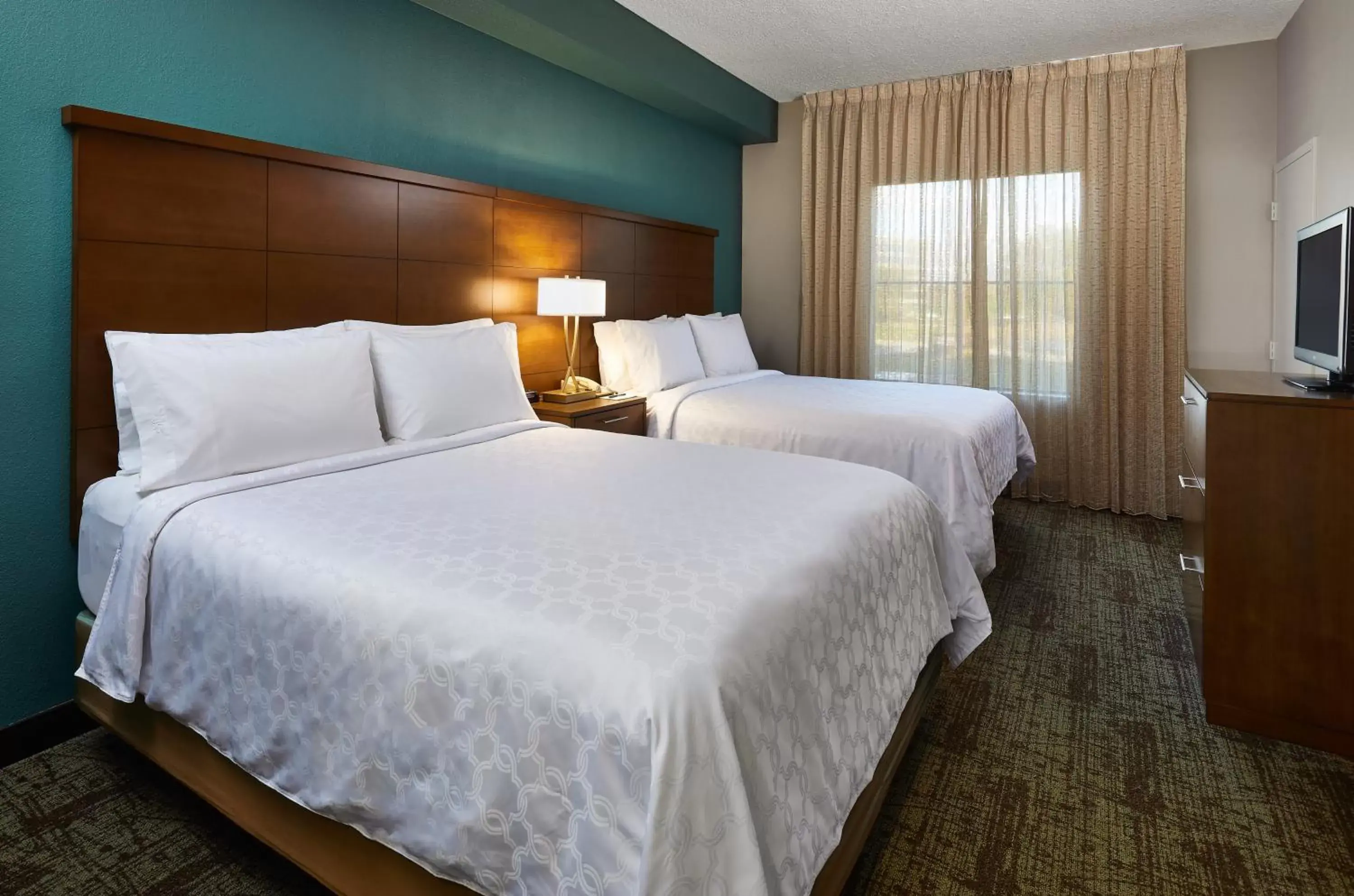 Photo of the whole room, Bed in Staybridge Suites Orlando South, an IHG Hotel