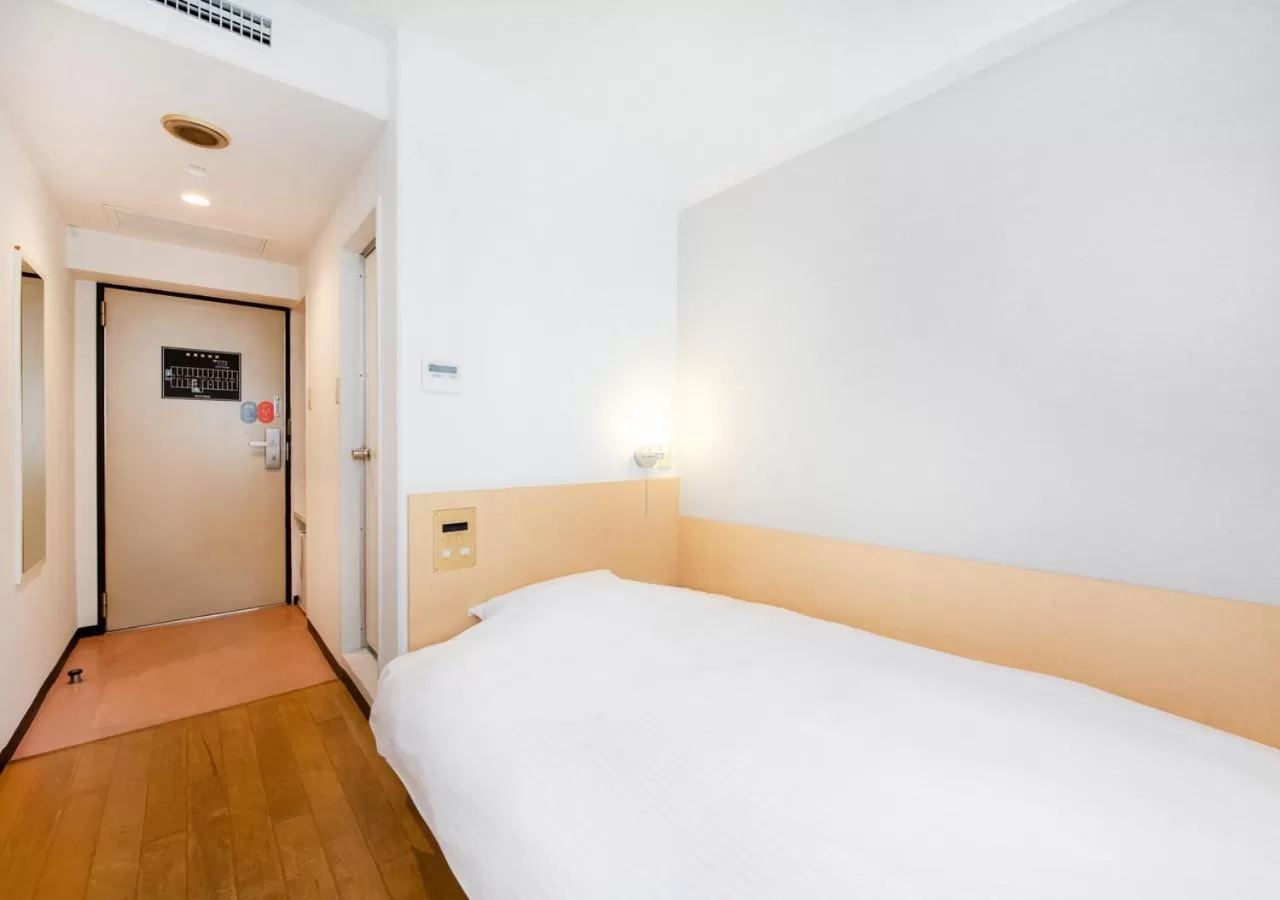 Bed in TKP Sunlife Hotel