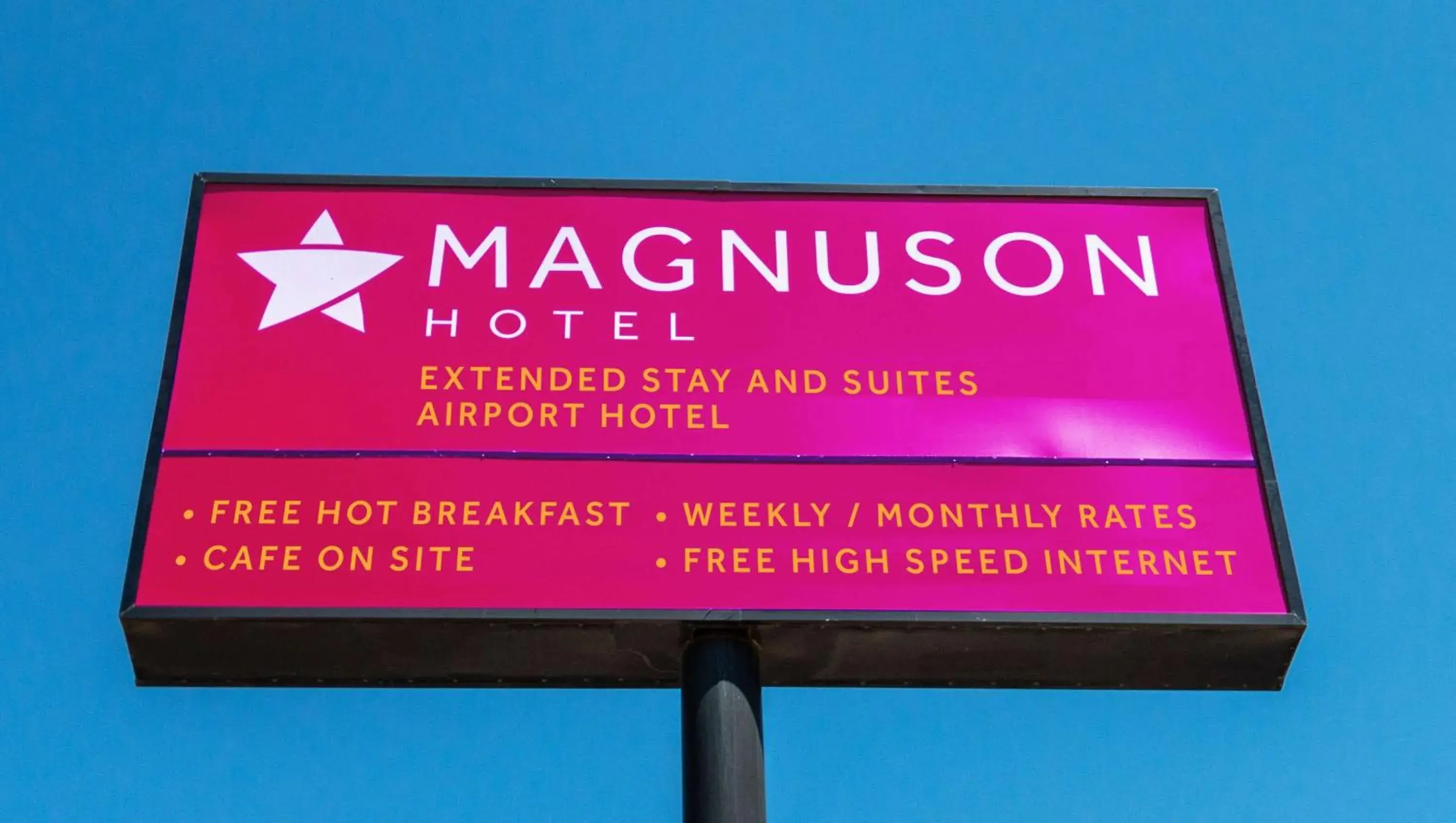 Property building in Magnuson Extended Stay and Suites Airport Hotel