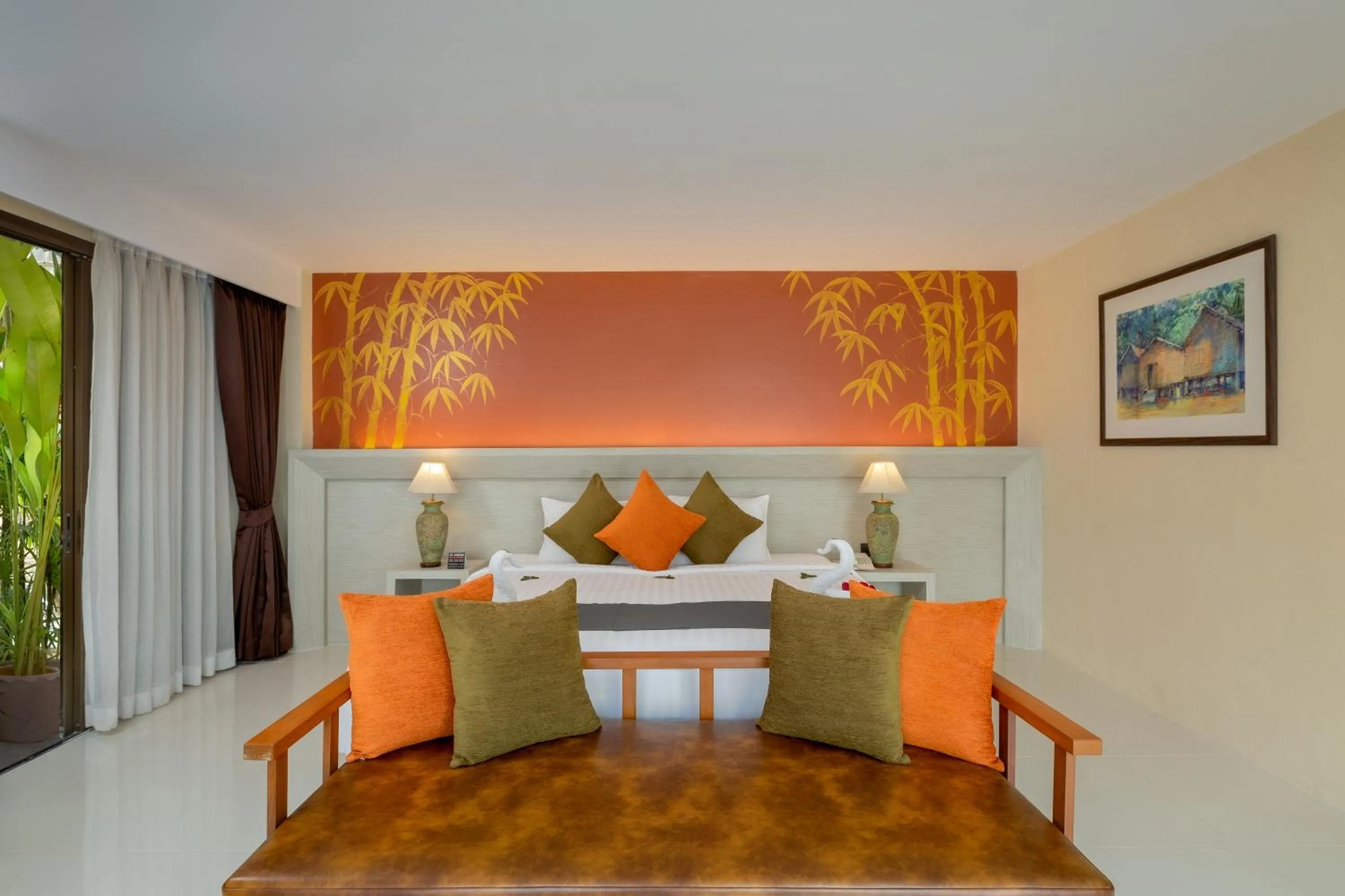 Seating area, Bed in Areca Resort and Spa