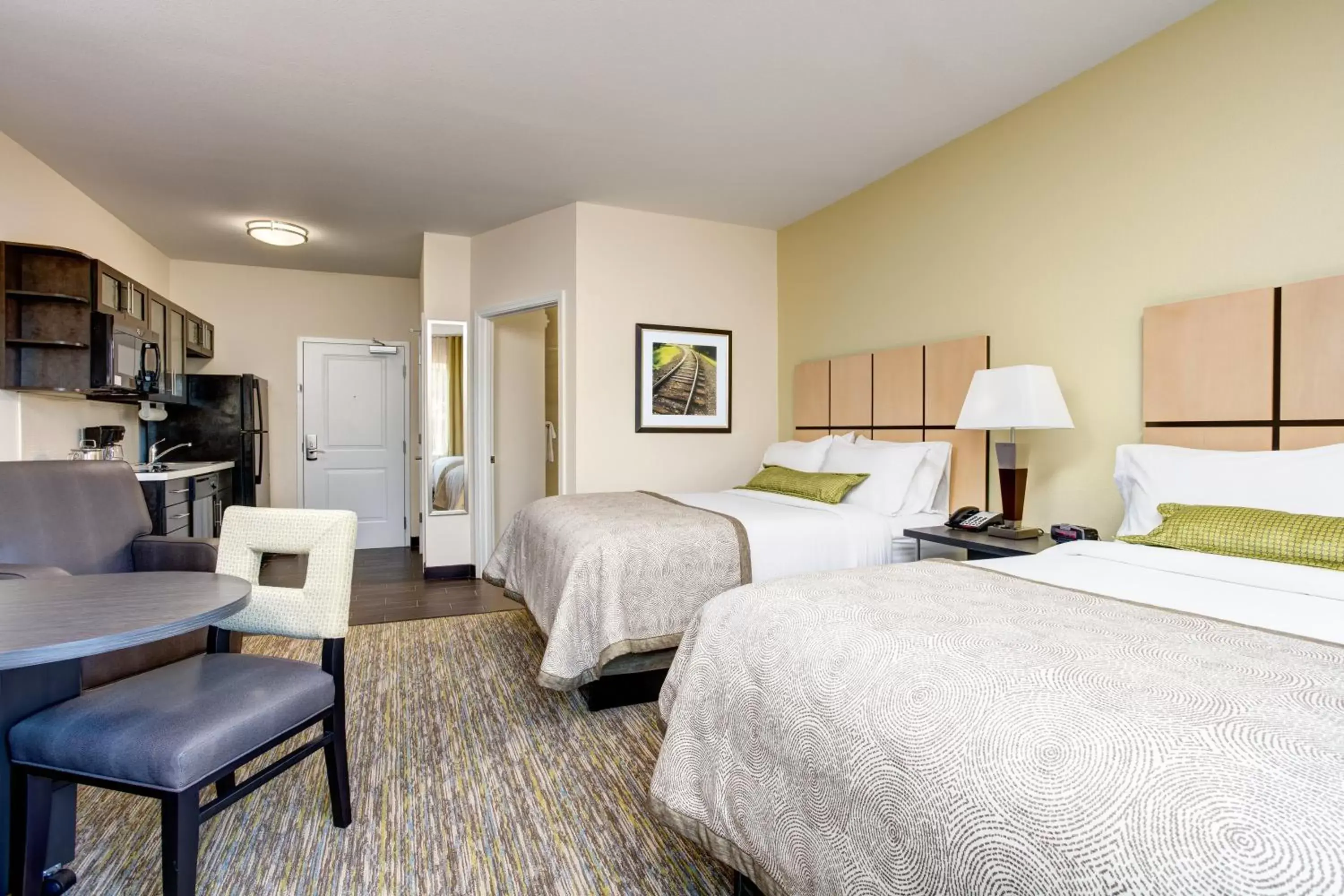 Bedroom in Candlewood Suites Cut Off - Galliano, an IHG Hotel