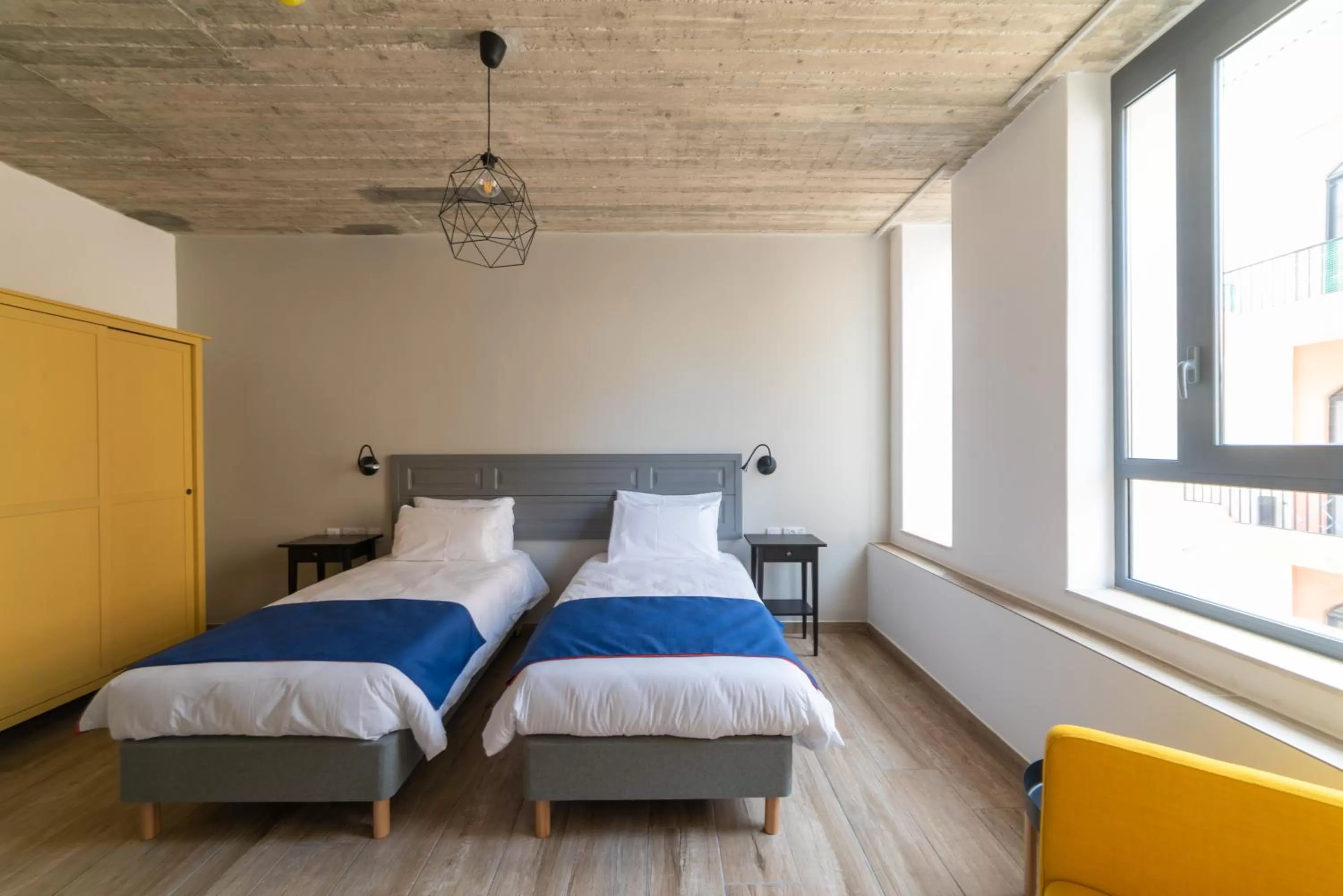 Bed in Chapter 5 Hotel