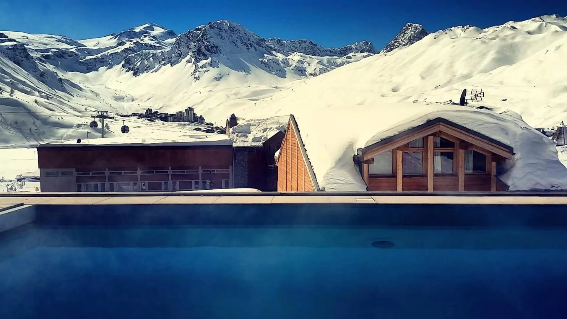 Swimming pool in Hôtel les Campanules by Les Etincelles