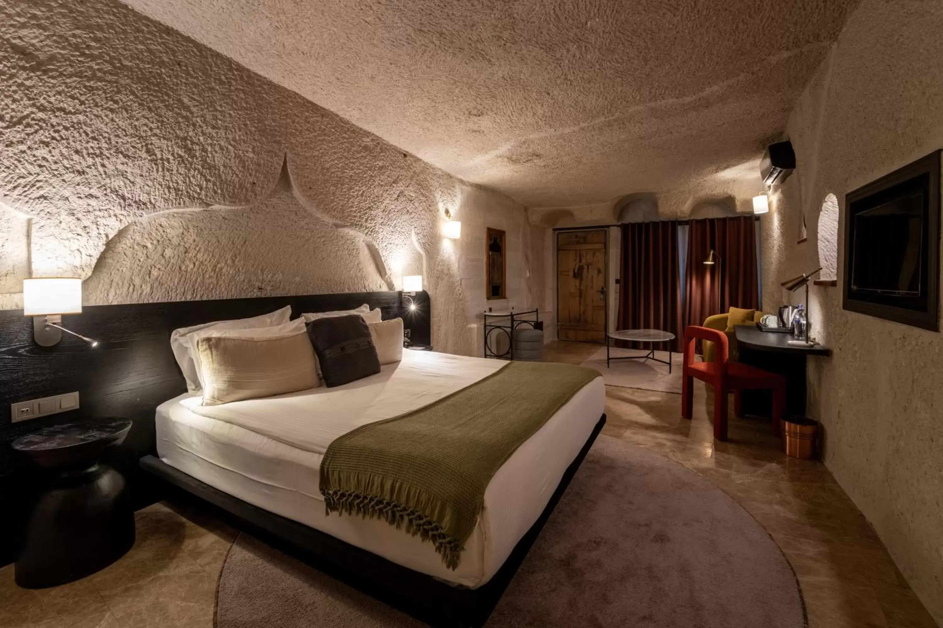 Bedroom, Bed in Artemis Cave Suites & Spa- Adults Only