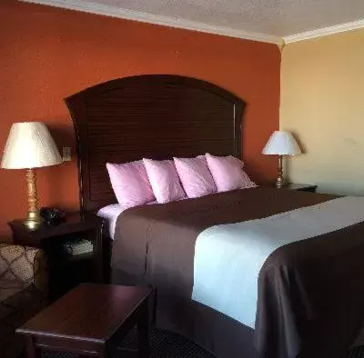 Bed in Americas Best Value Inn Schulenburg
