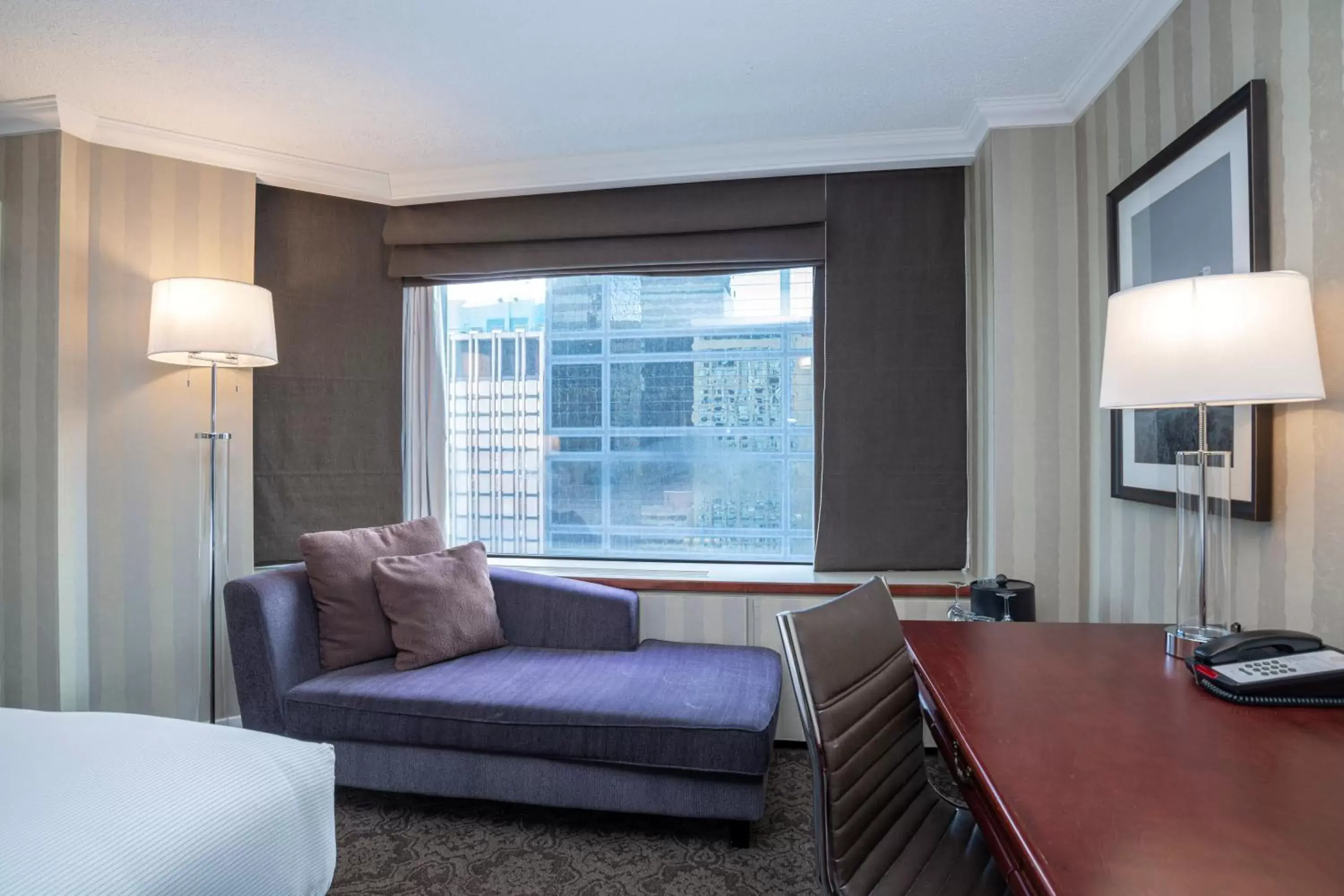 Photo of the whole room, Seating Area in Sandman Signature Edmonton Downtown Hotel