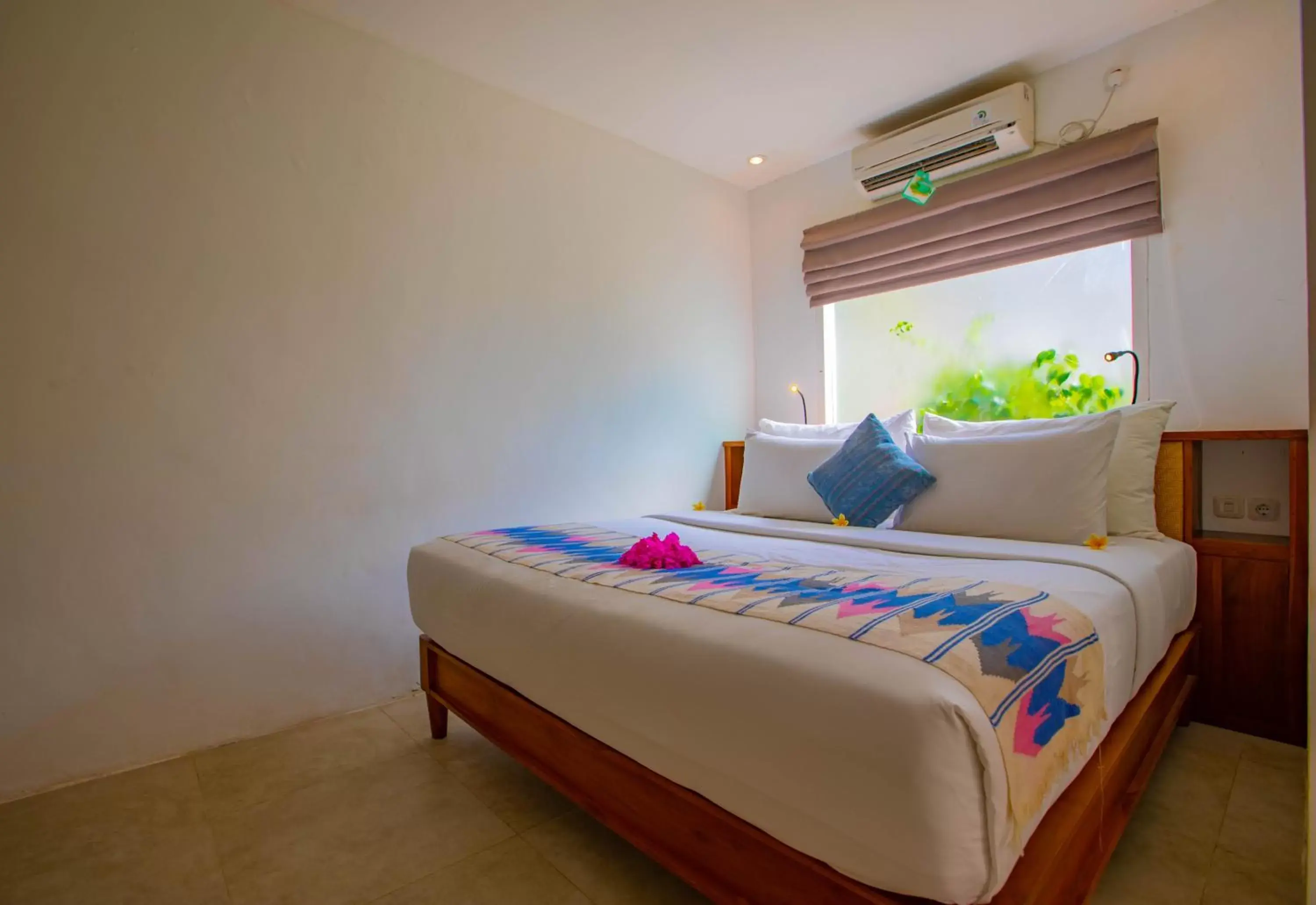 Bed in Gili Sands Hotel & Bar