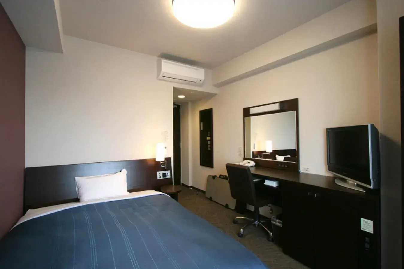Photo of the whole room, Bed in Hotel Route Inn Yaizu Inter