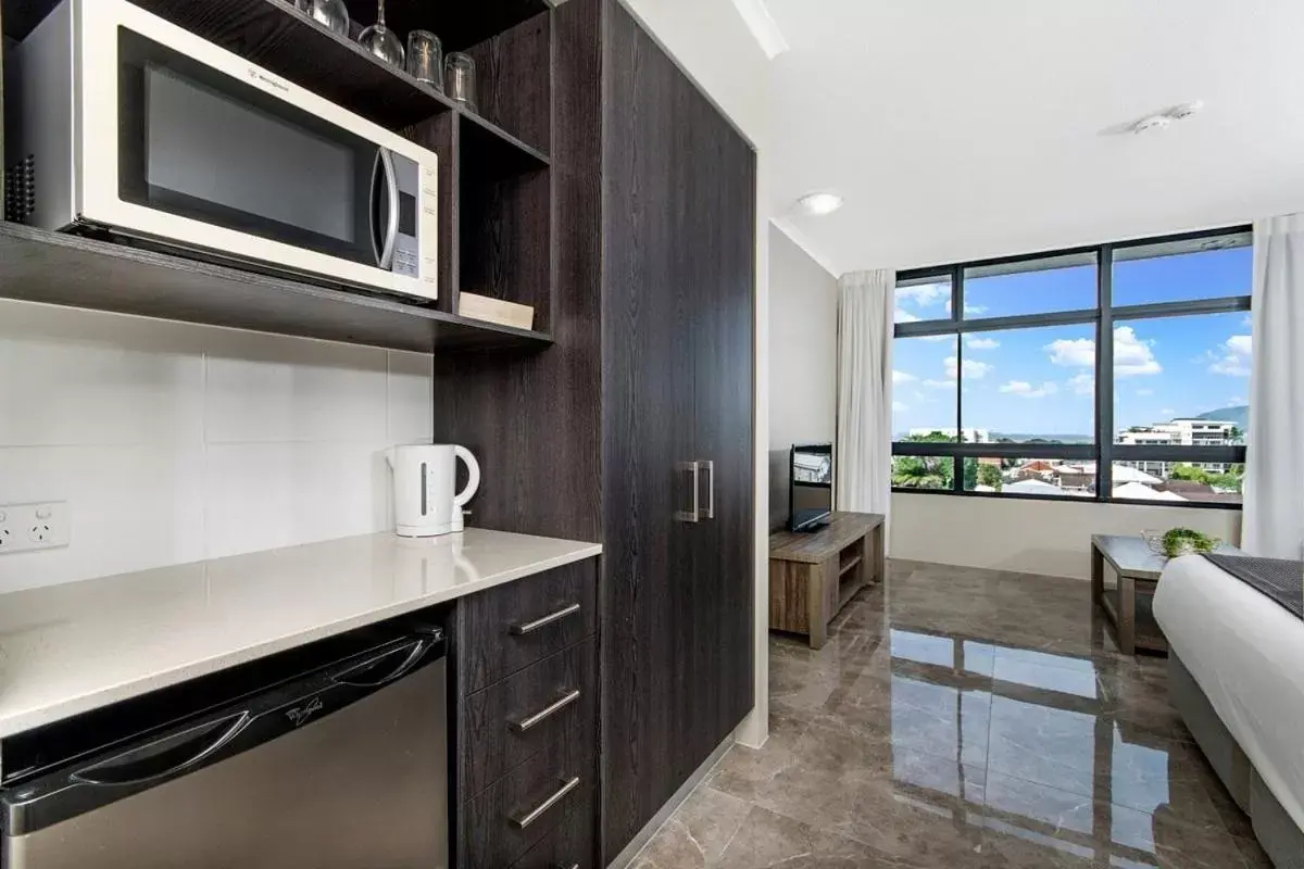 Kitchen or kitchenette in Sunshine Tower Hotel