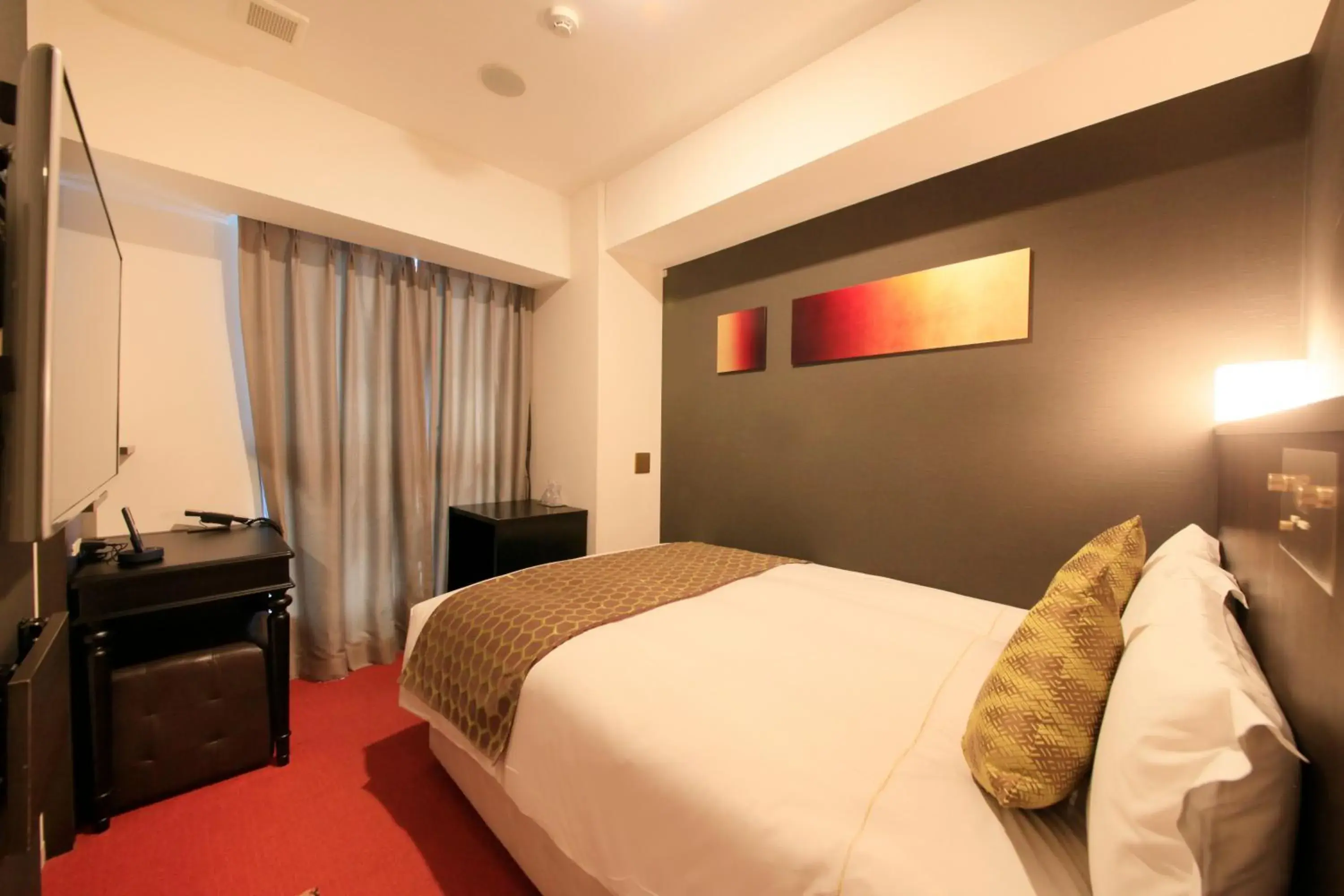 Photo of the whole room, Bed in Centurion Hotel Ikebukuro Station