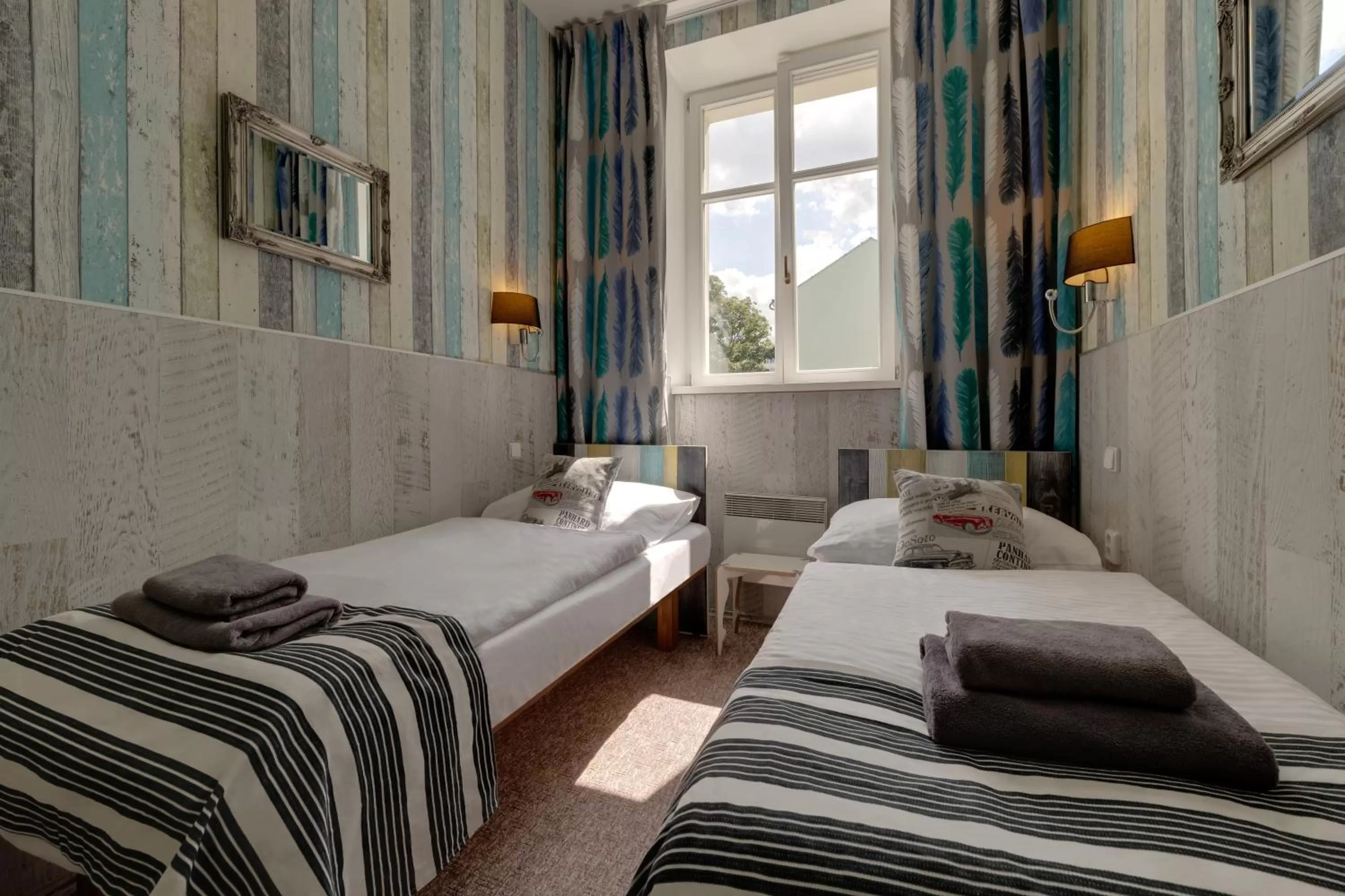 Bed in Royal Court Hotel