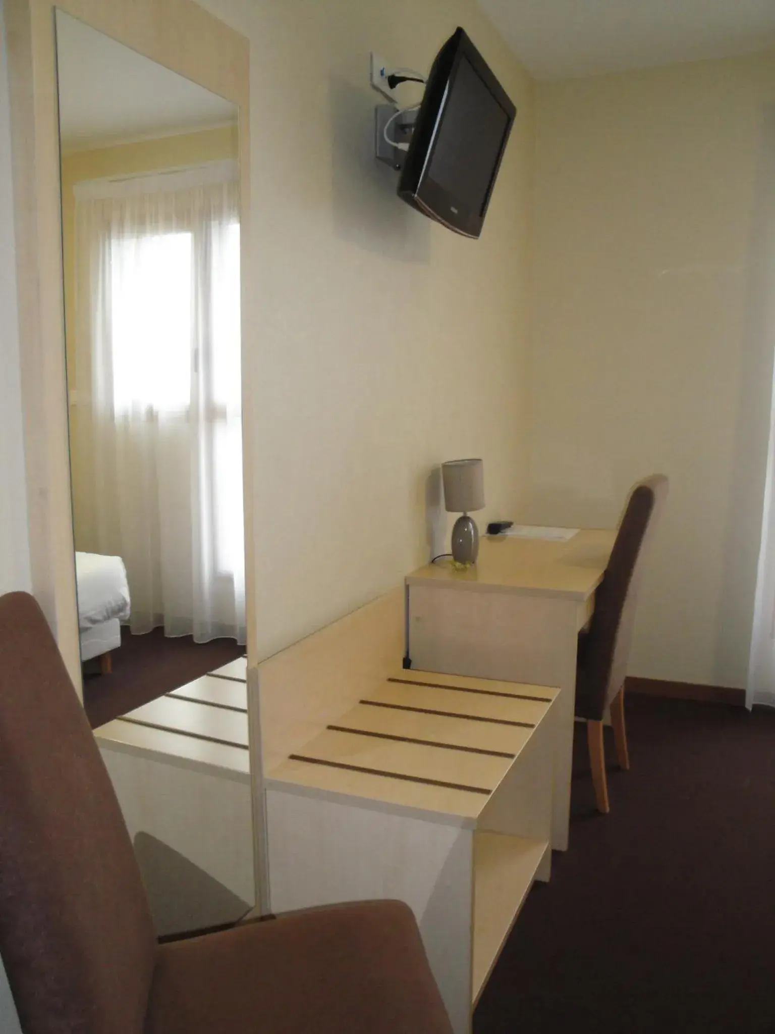 Photo of the whole room, TV/Entertainment Center in Hotel Talencia