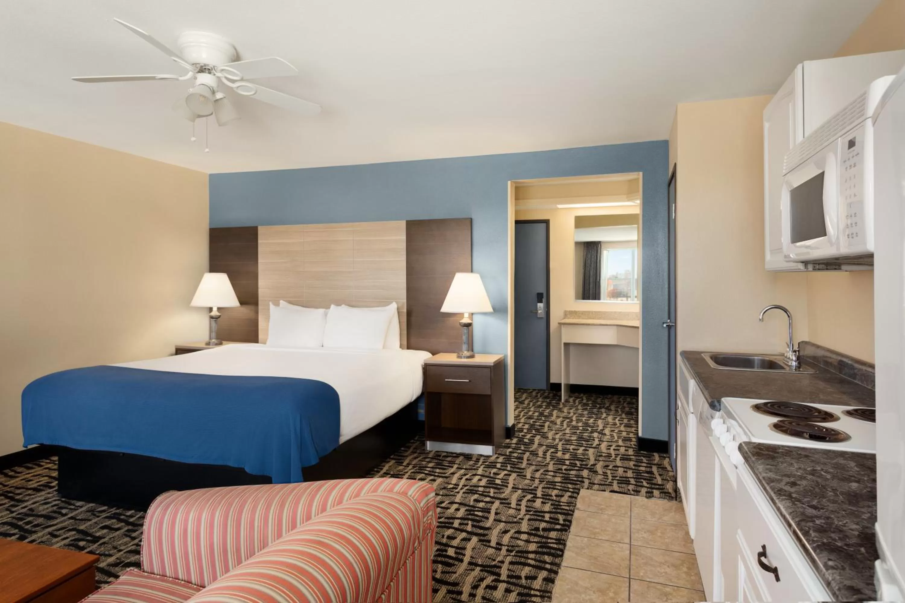 Photo of the whole room, Bed in Baymont by Wyndham Ft. Leonard/Saint Robert