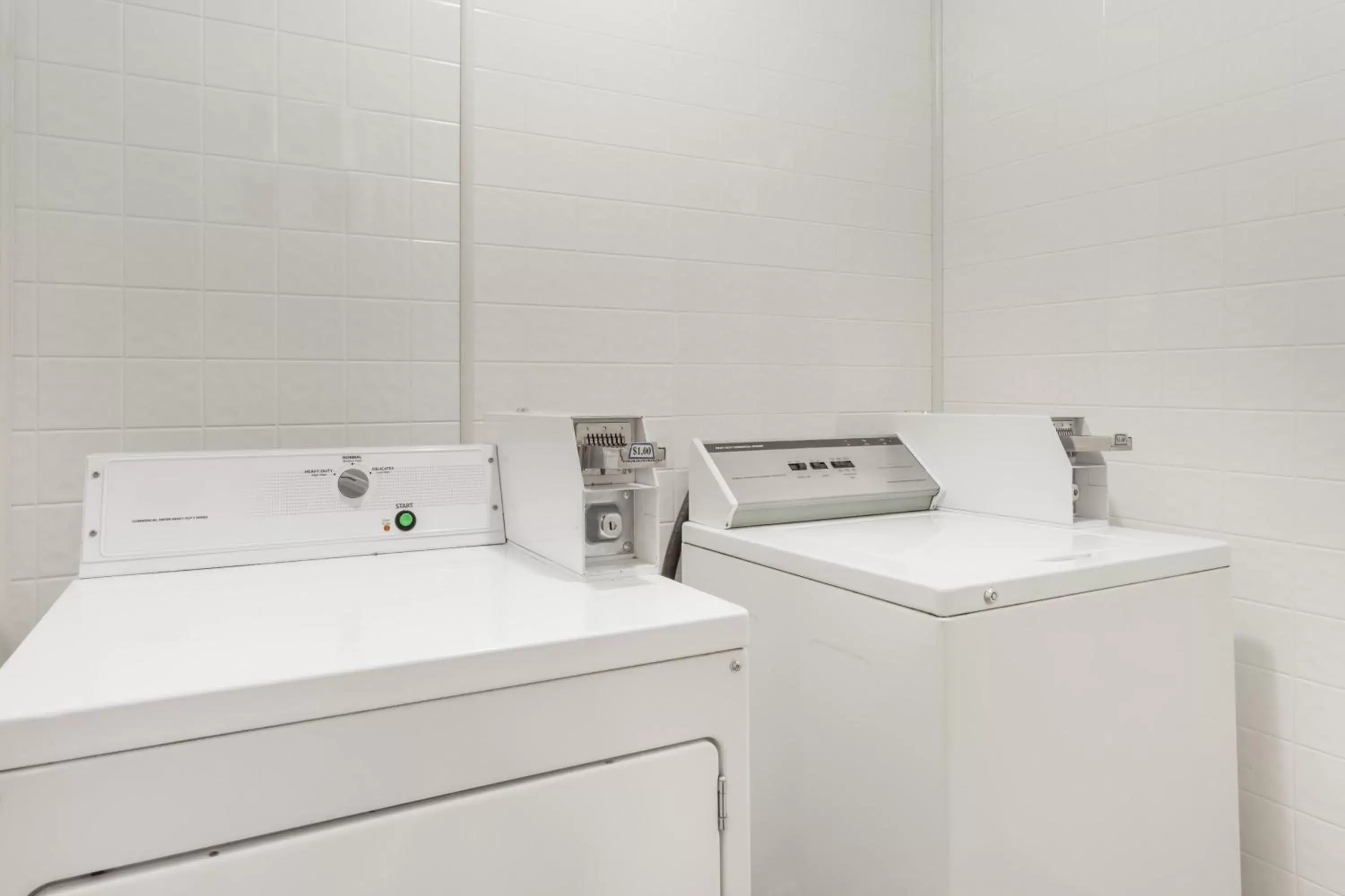 washing machine, Bathroom in Baymont by Wyndham Greensboro/Coliseum