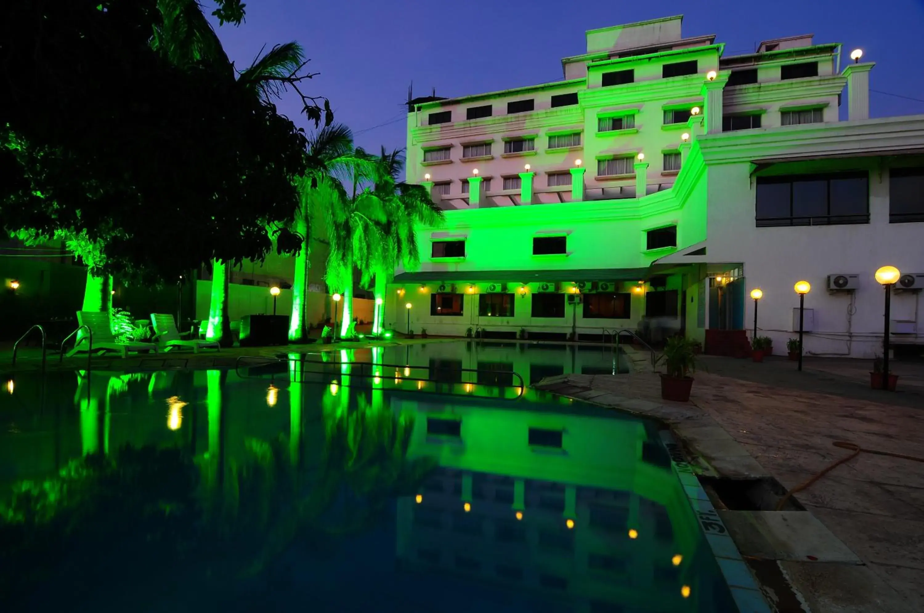 Facade/entrance, Swimming Pool in Quality Inn Regency, Nashik