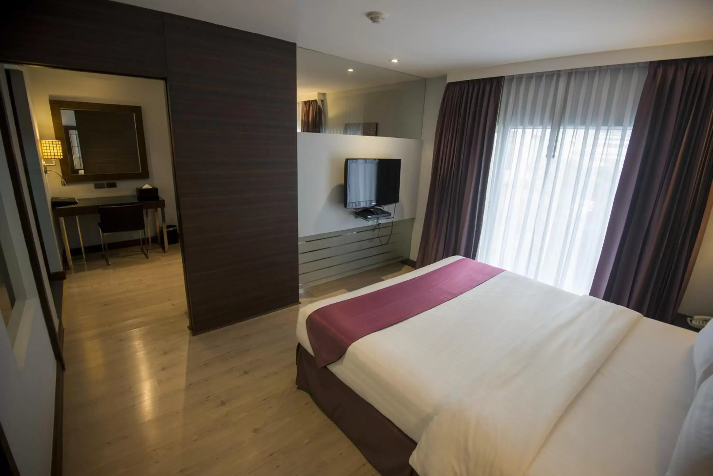 Bed in Sukhumvit Suites Hotel