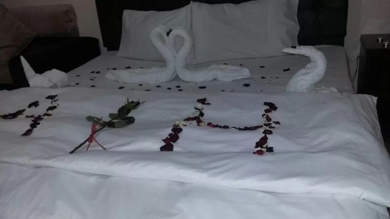 Bed in Al Tawheed Hotel Apartments