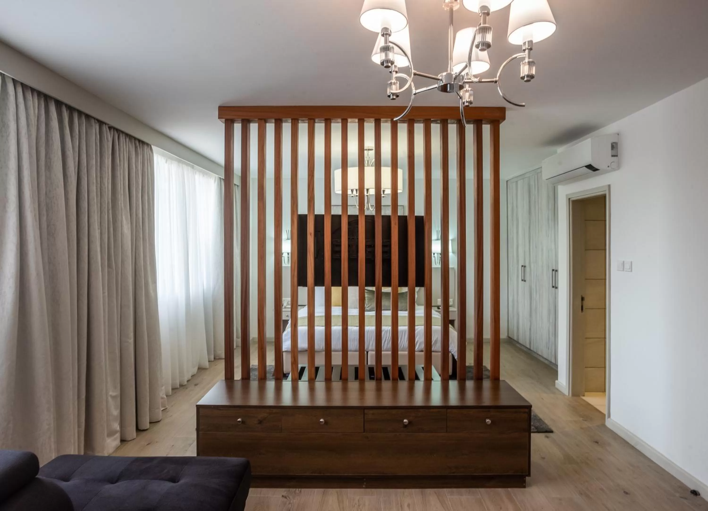 Seating area, Bed in Yaya Hotel & Apartments