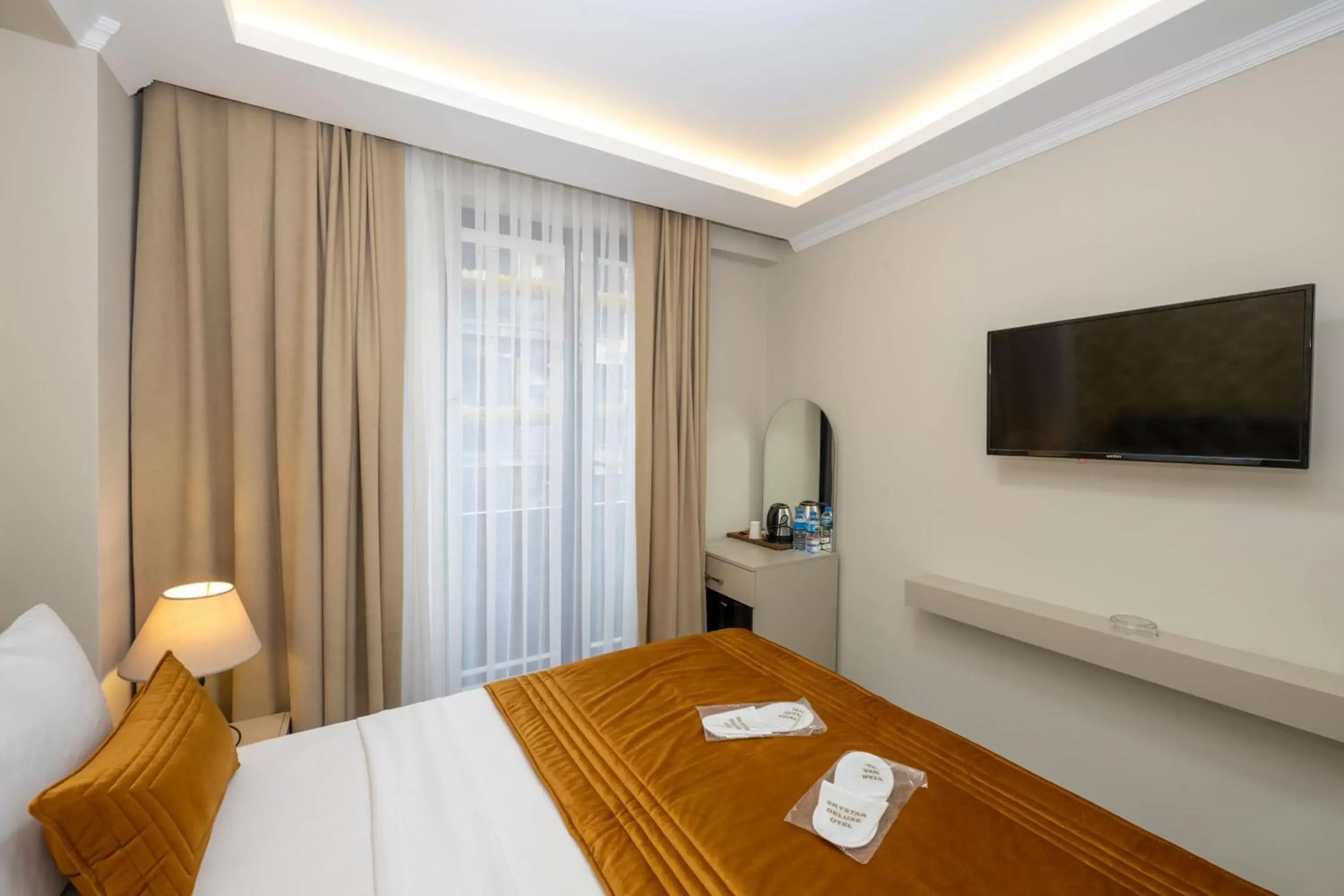 Bed in SKYSTAR DELUXE HOTEL Bed in SKYSTAR DELUXE HOTEL