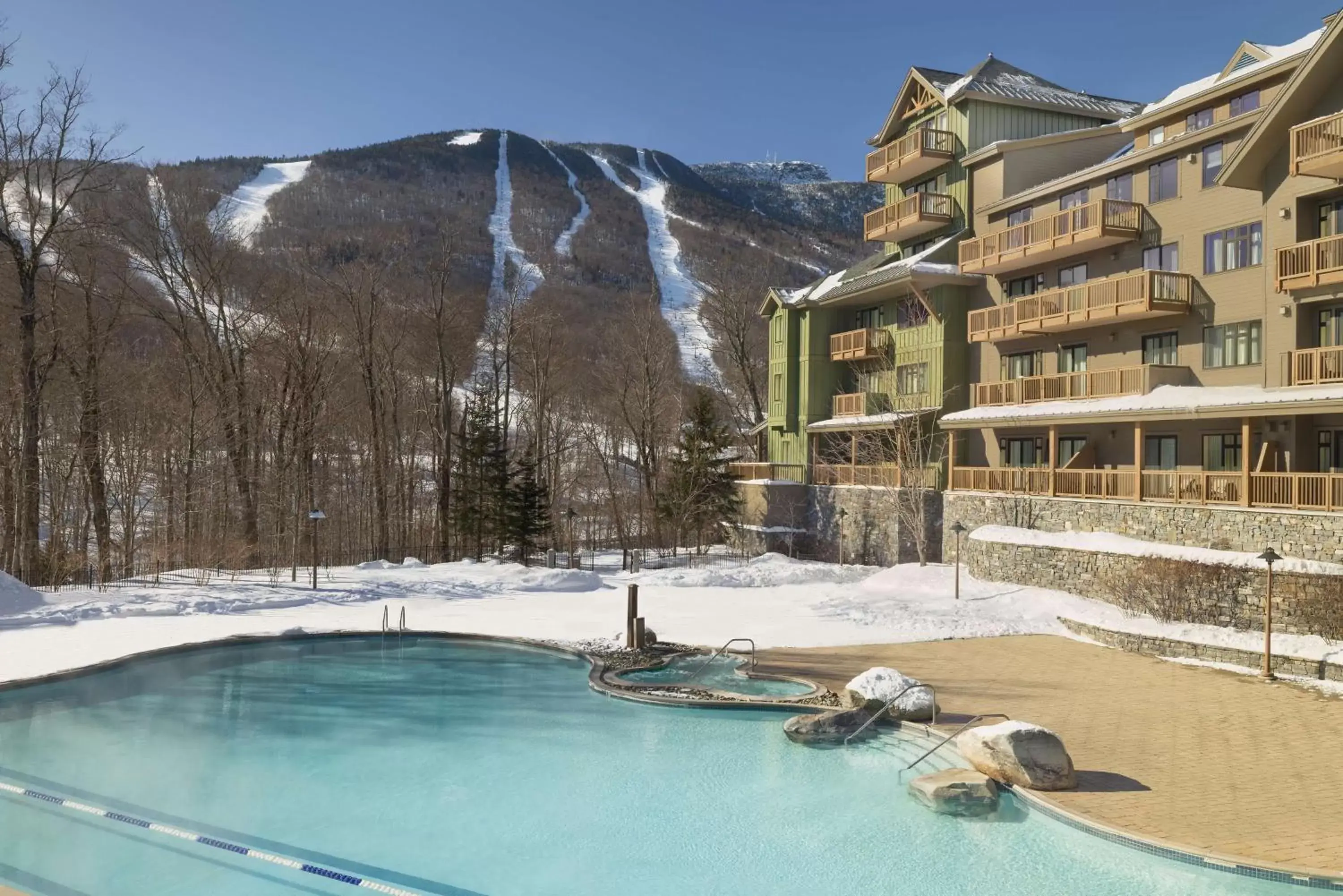 Swimming pool, Winter in The Lodge at Spruce Peak, a Destination by Hyatt Residence