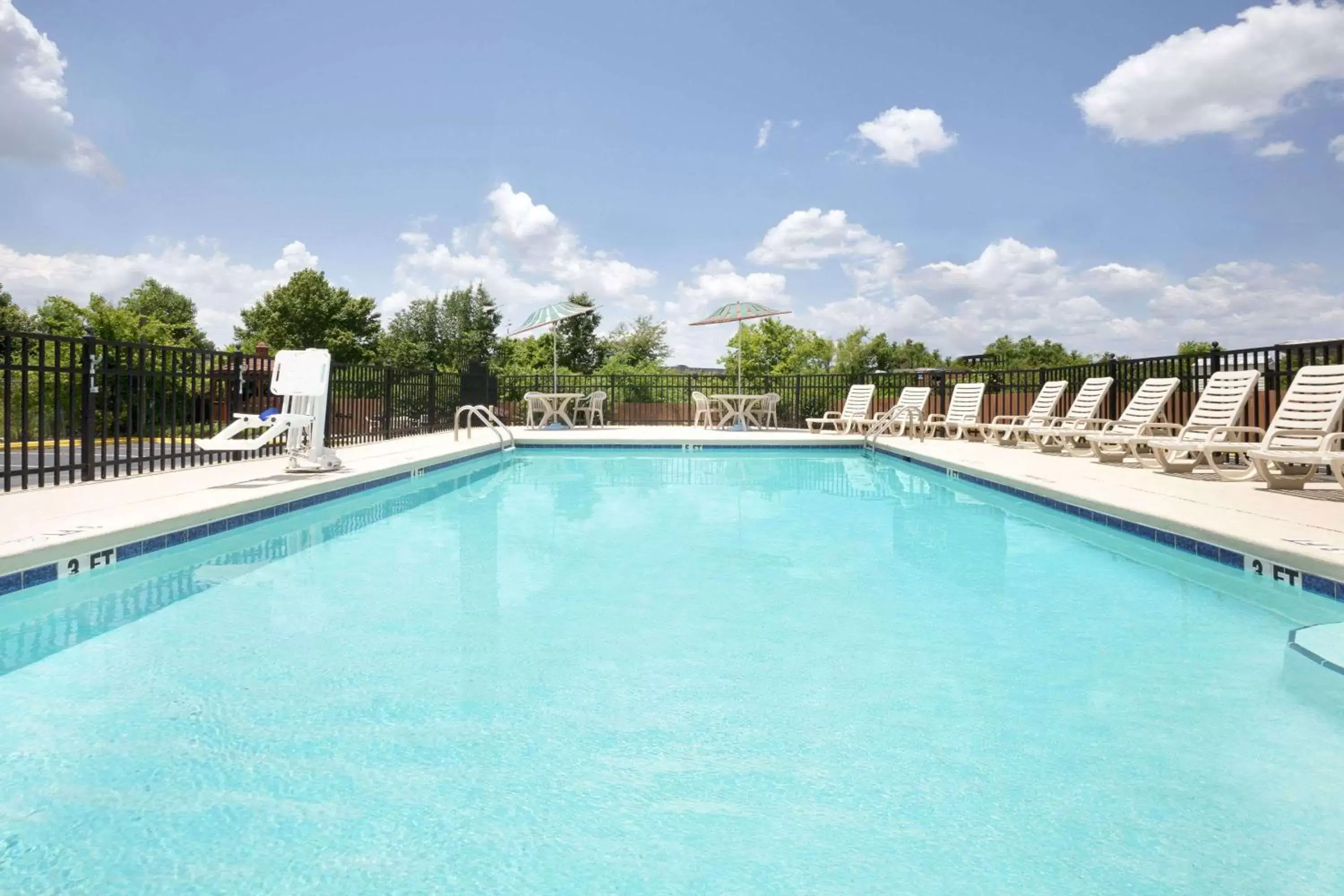 On site, Swimming Pool in Days Inn by Wyndham Columbus-North Fort Benning