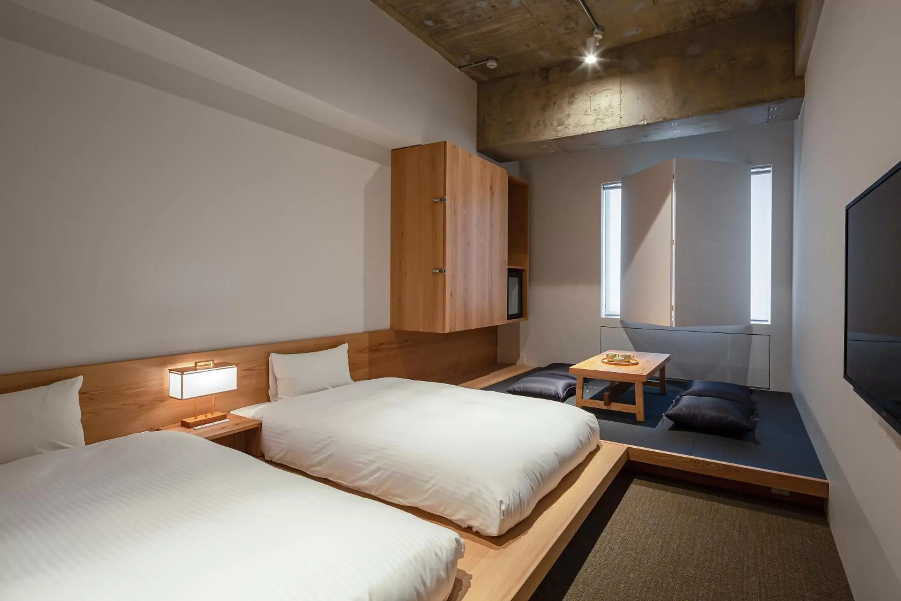 Photo of the whole room, Bed in TSUGU Kyoto Sanjo by THE SHARE HOTELS