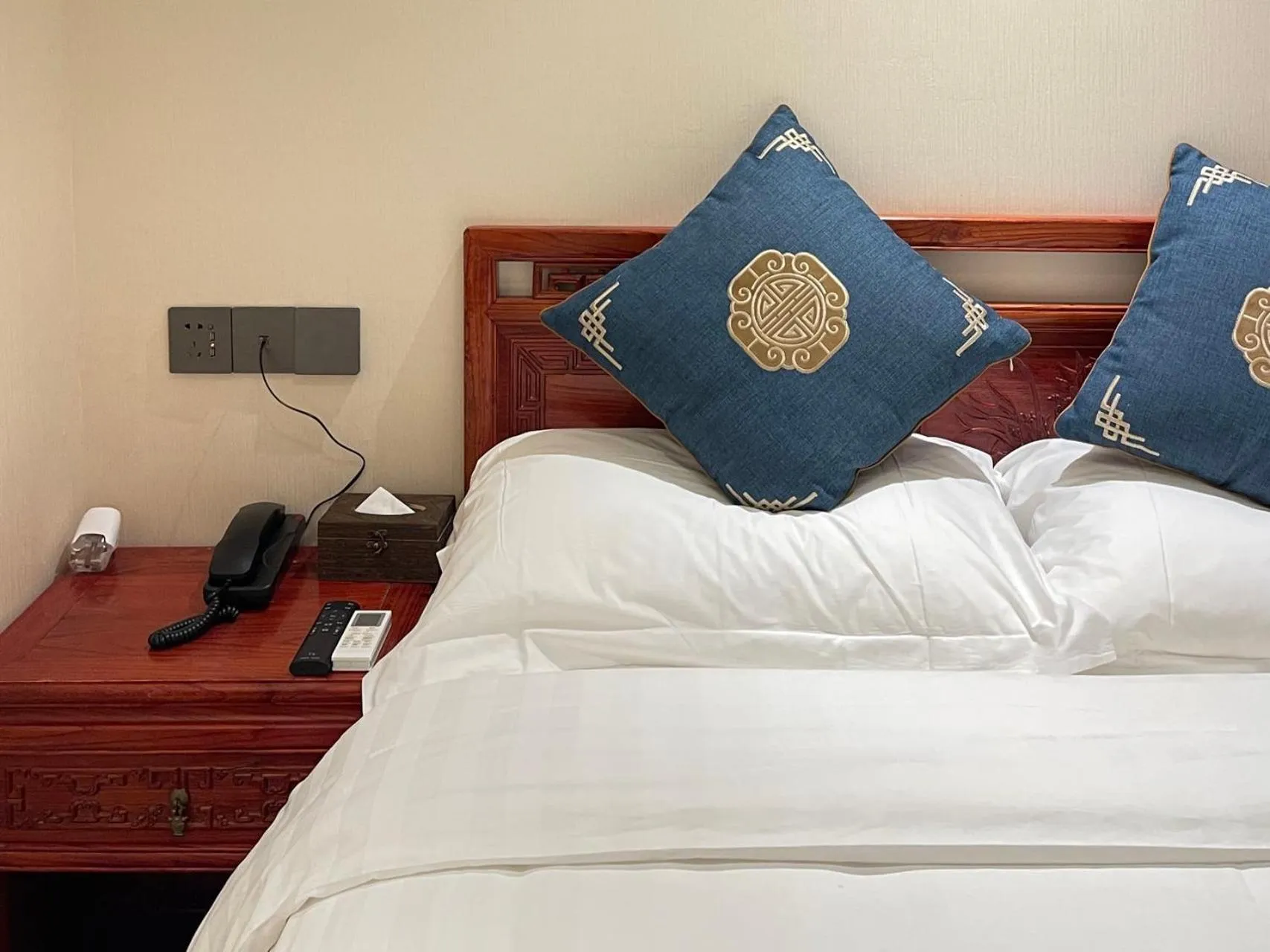 Bed in Beijing Hyde Courtyard Hotel