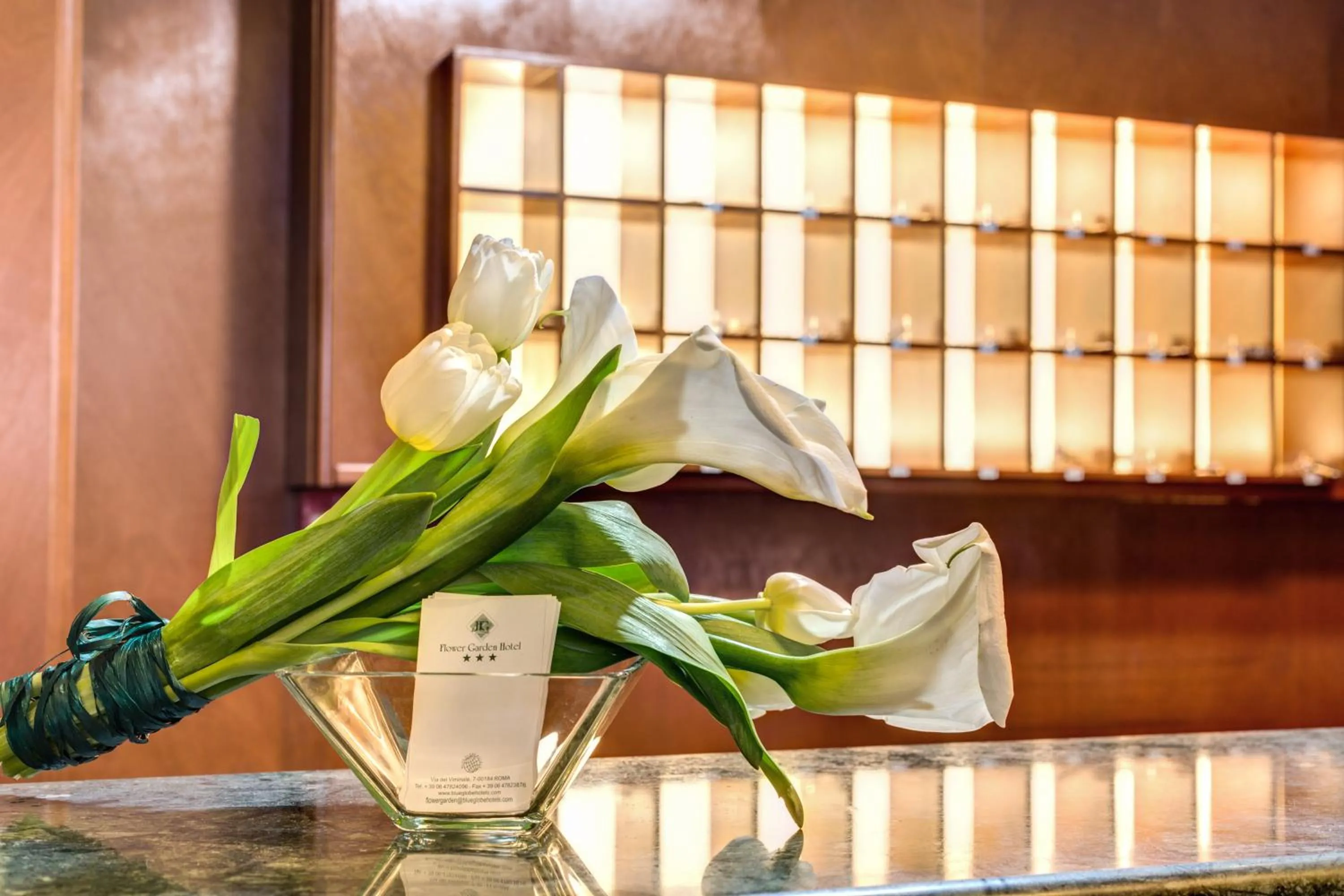 Property logo or sign in Flower Garden Hotel